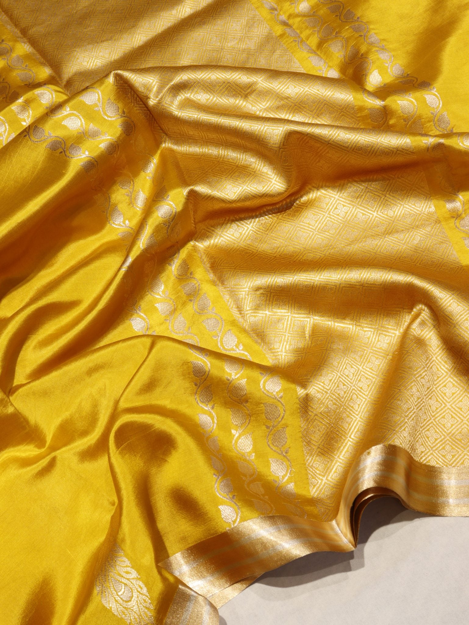 Mustard Yellow Soft Katan Banarasi saree border closeup