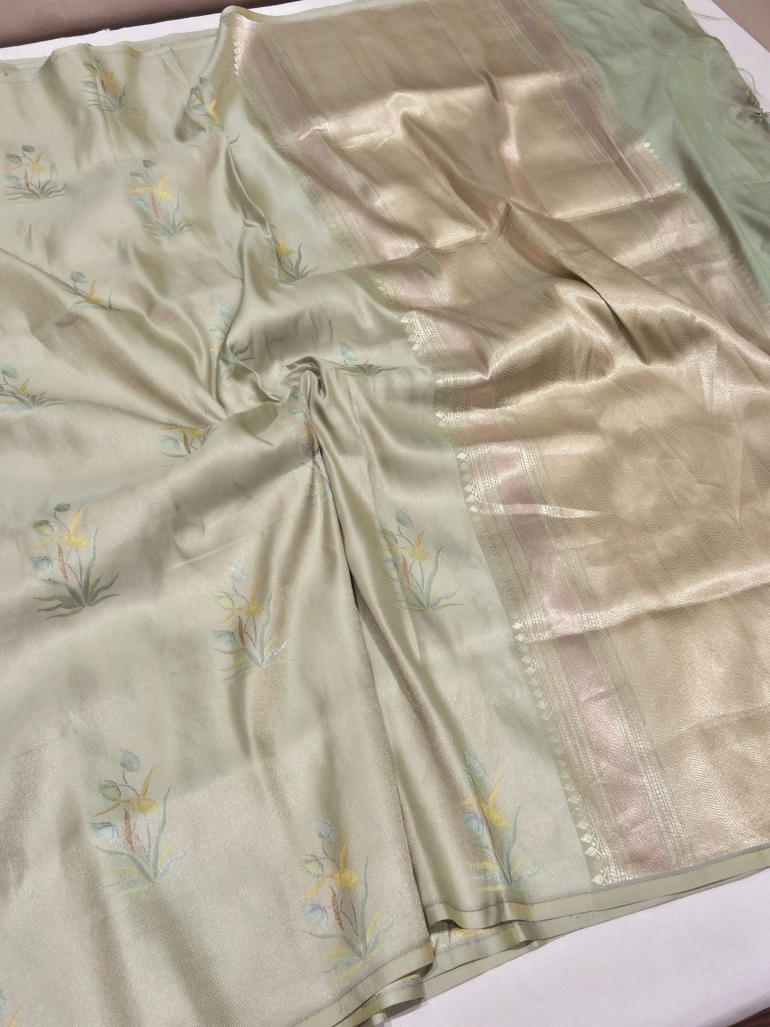 Pista Green Mulberry Silk Banarasi saree border closeup