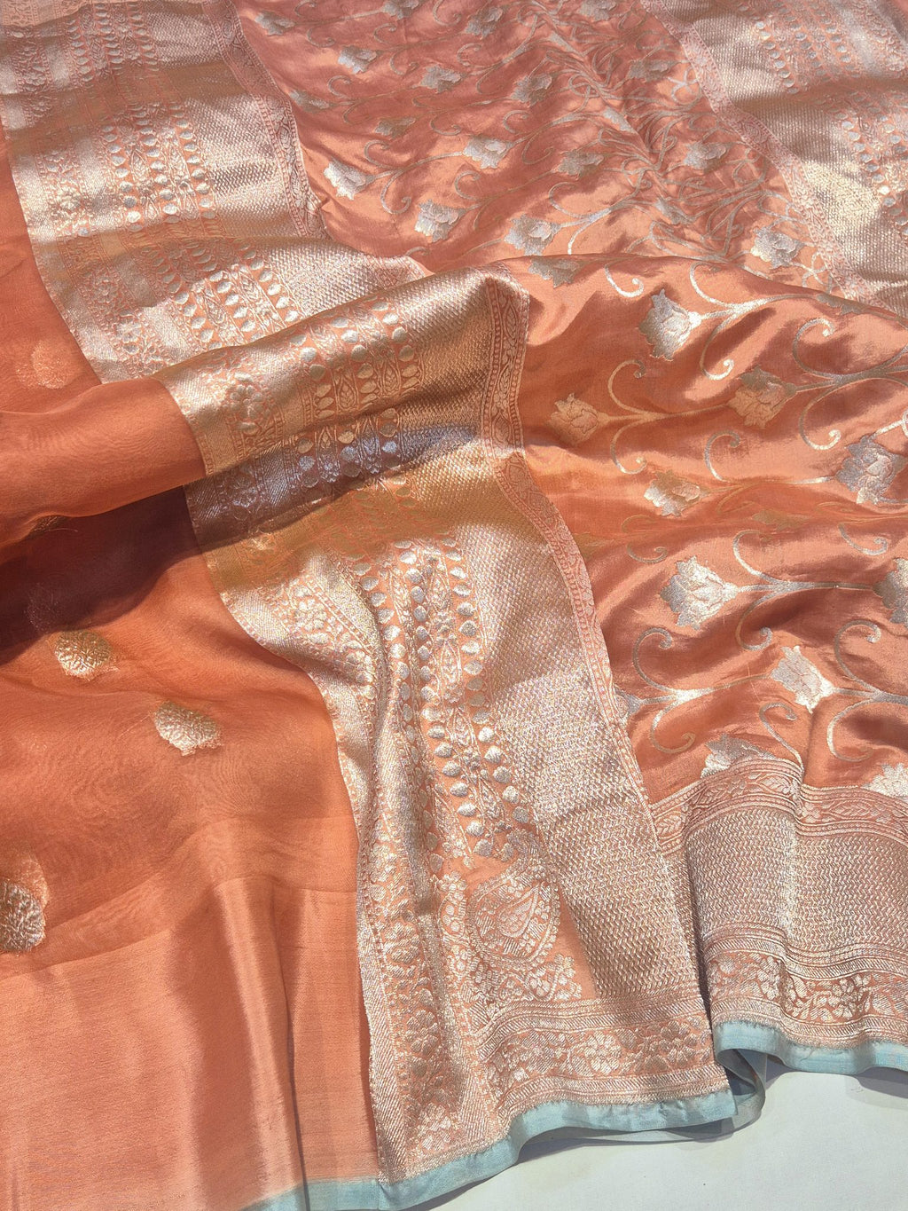 Warm Rust Peach Kora Silk Banarasi saree pallu detail