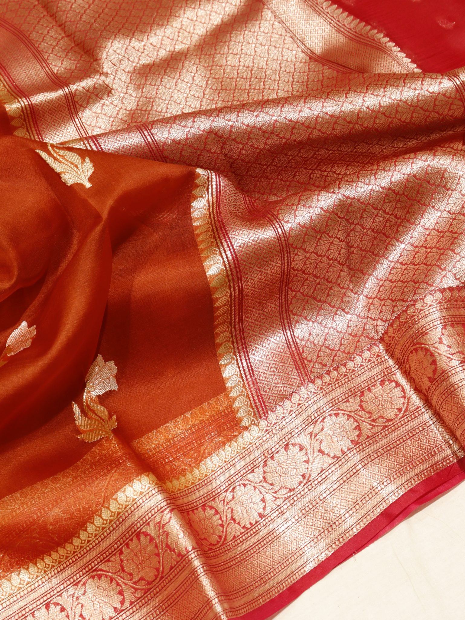 Rust Orange Kora Silk Banarasi saree front drape view