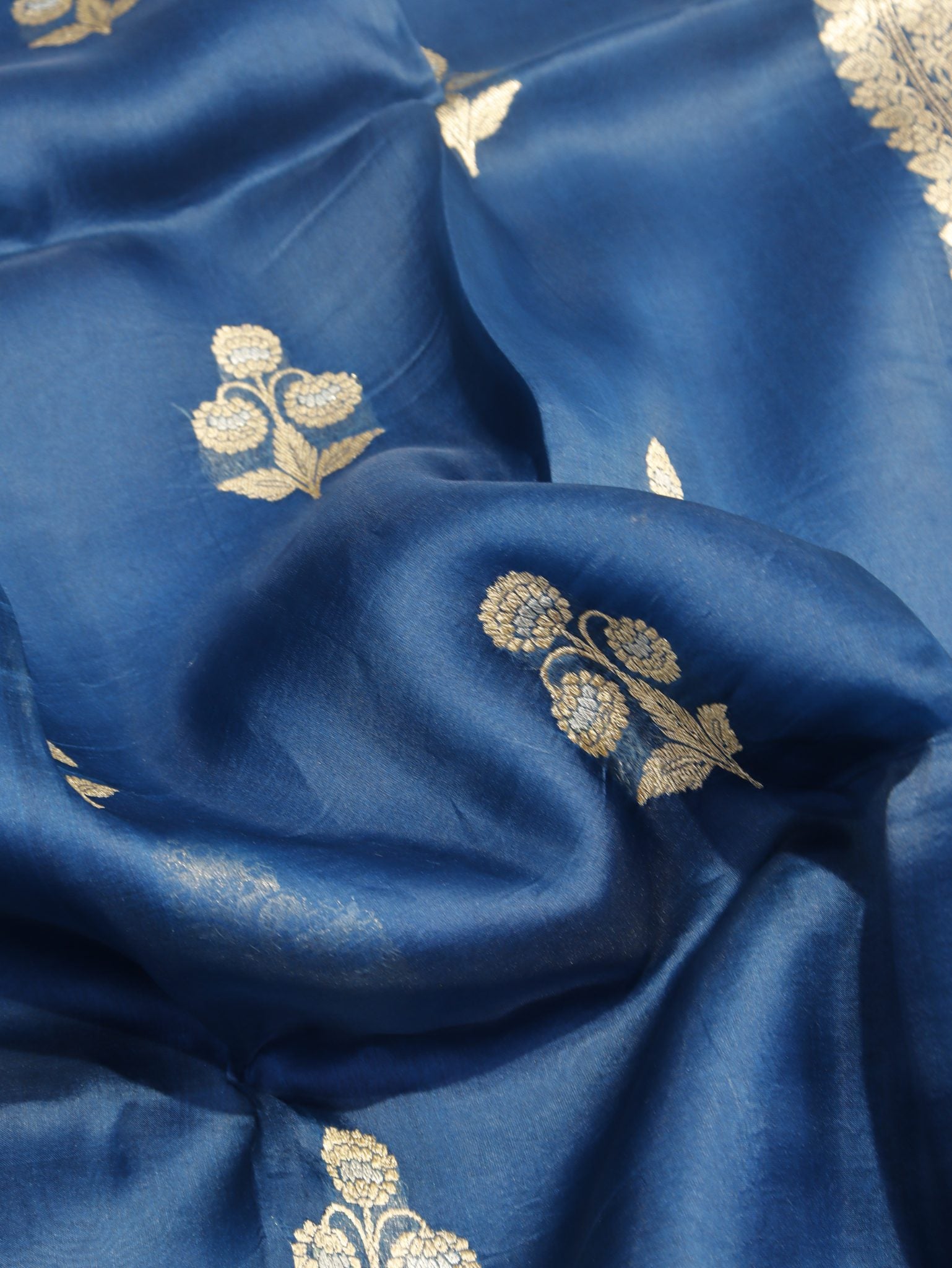Peacock Blue Kora Silk Banarasi saree border closeup
