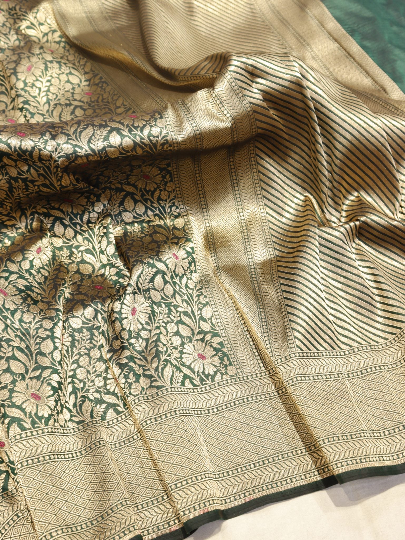 Bottle Green Katan Silk Banarasi saree front drape view