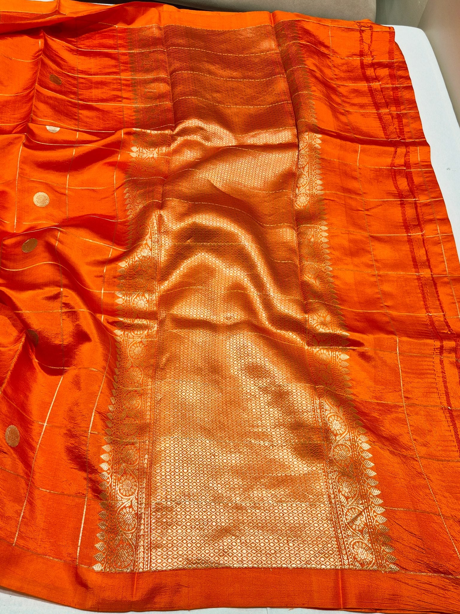 Orange Soft Katan Banarasi saree border closeup
