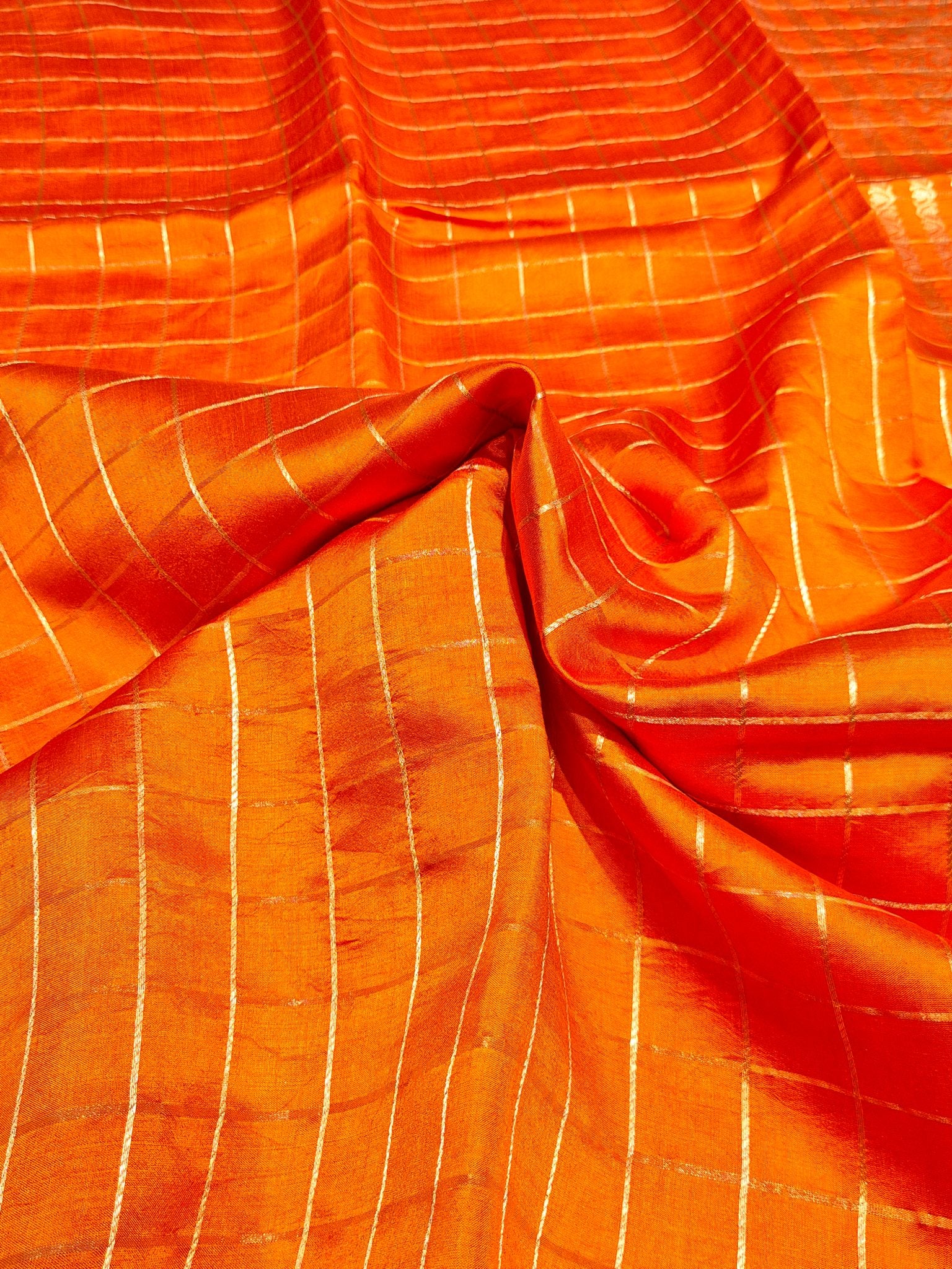 Orange Soft Katan Banarasi saree border closeup