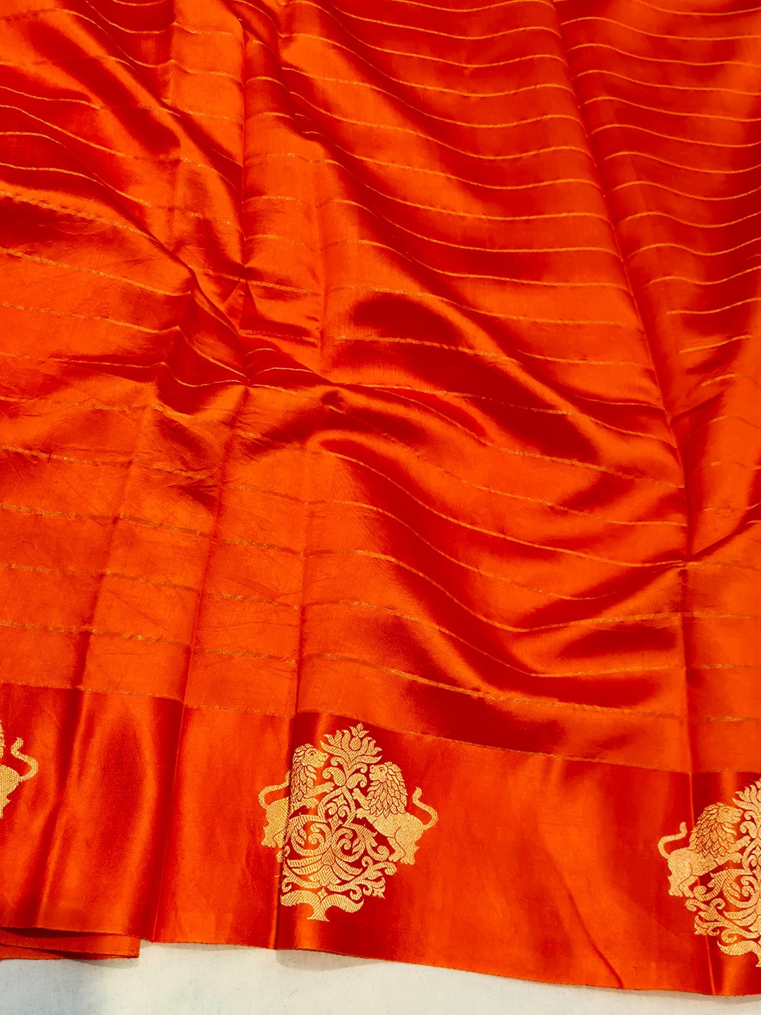 Orange Soft Katan Banarasi saree texture detail