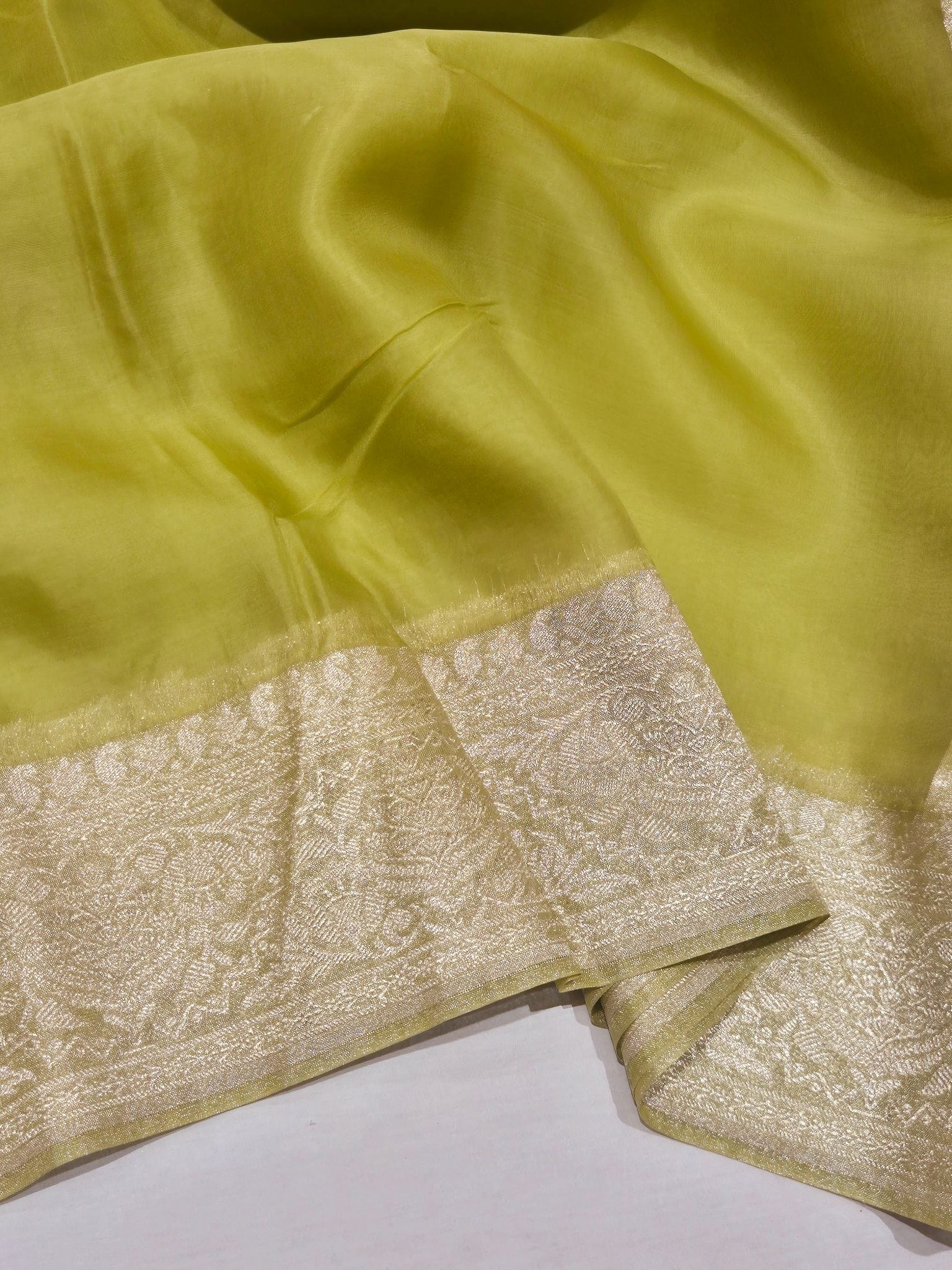 Green Kora Silk Banarasi saree border closeup