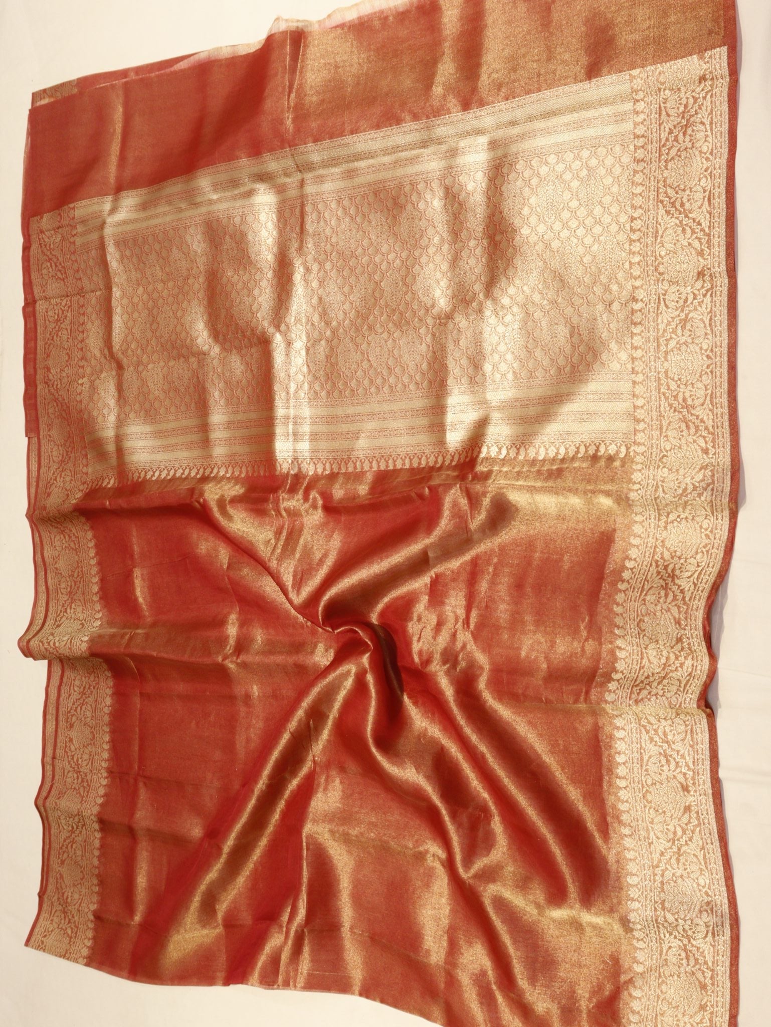 Rust Orange Tissue Silk Banarasi saree zari work detail