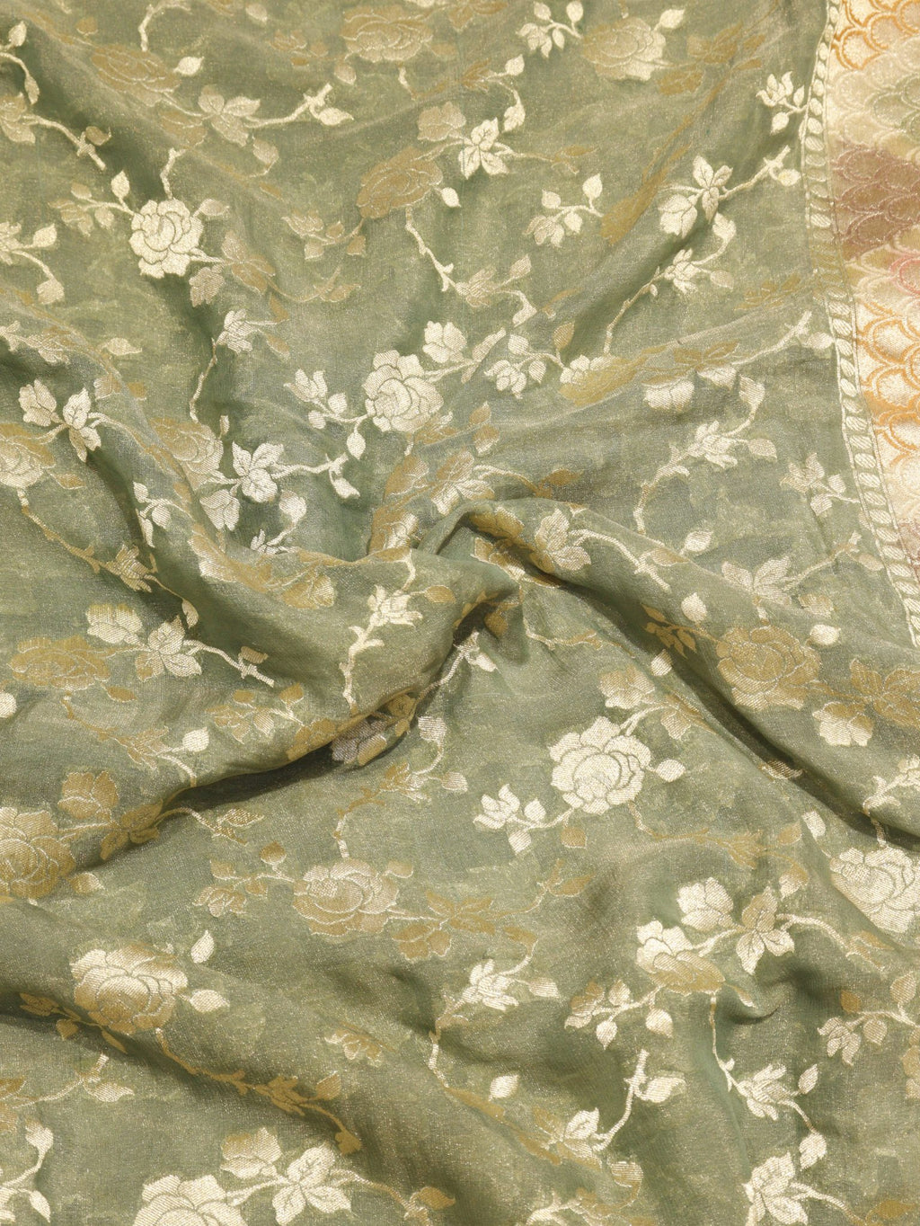 Green Pure Georgette Tissue Silk Banarasi saree border closeup