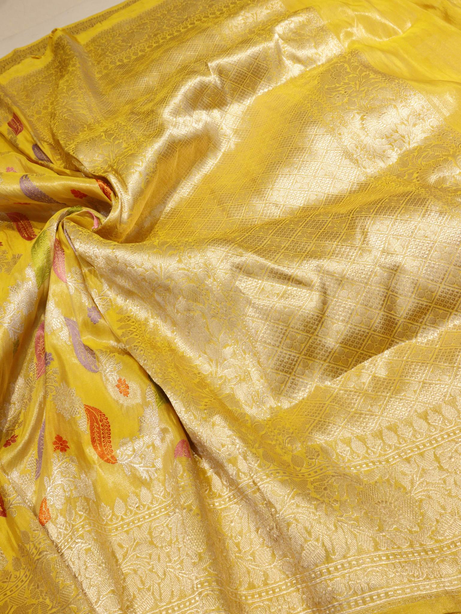 Yellow Tissue Silk Banarasi saree border closeup