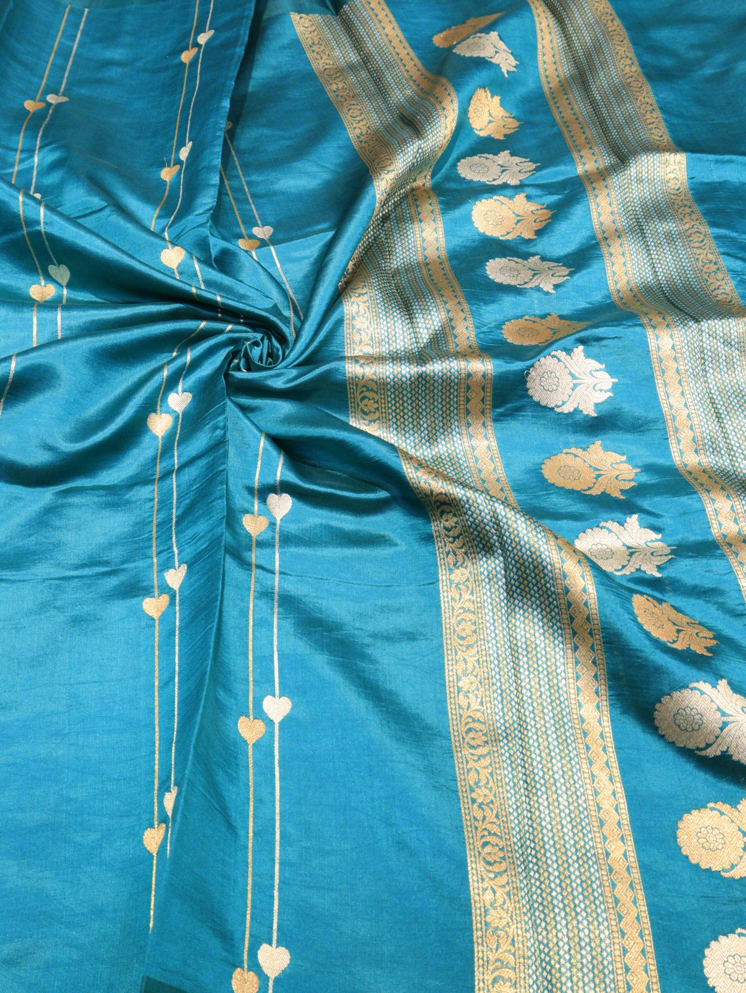 Dark Turquoise Katan Silk Banarasi saree border closeup