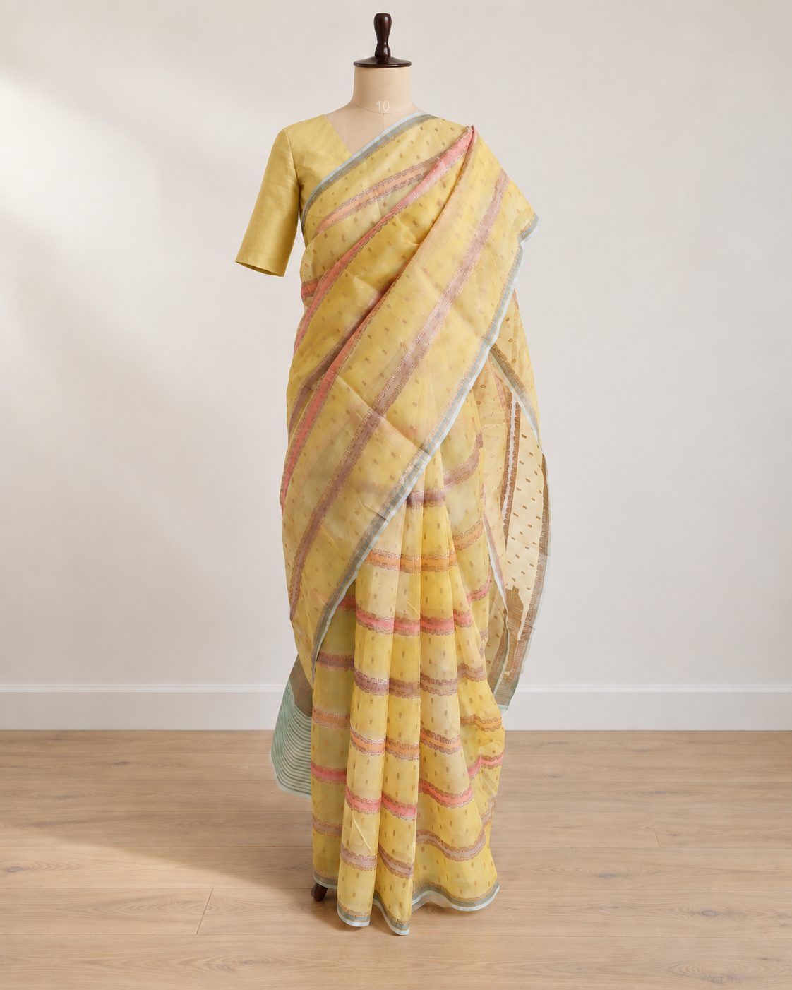 Solid pale yellow saree Kora Silk Banarasi saree front drape view