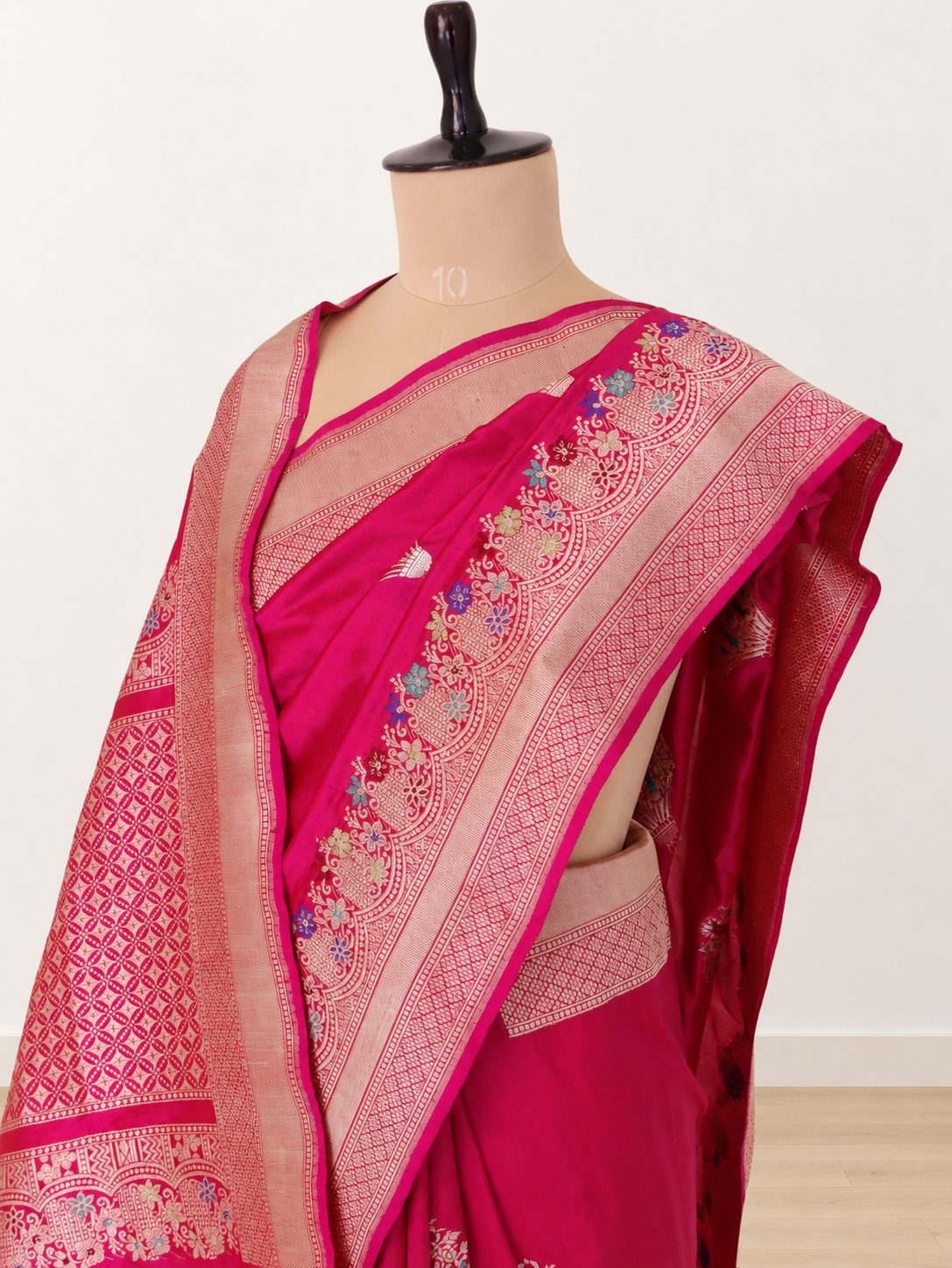 Rich rani pink with zari detailing and multicoloured Meenakari accents Katan Silk Banarasi saree front drape view