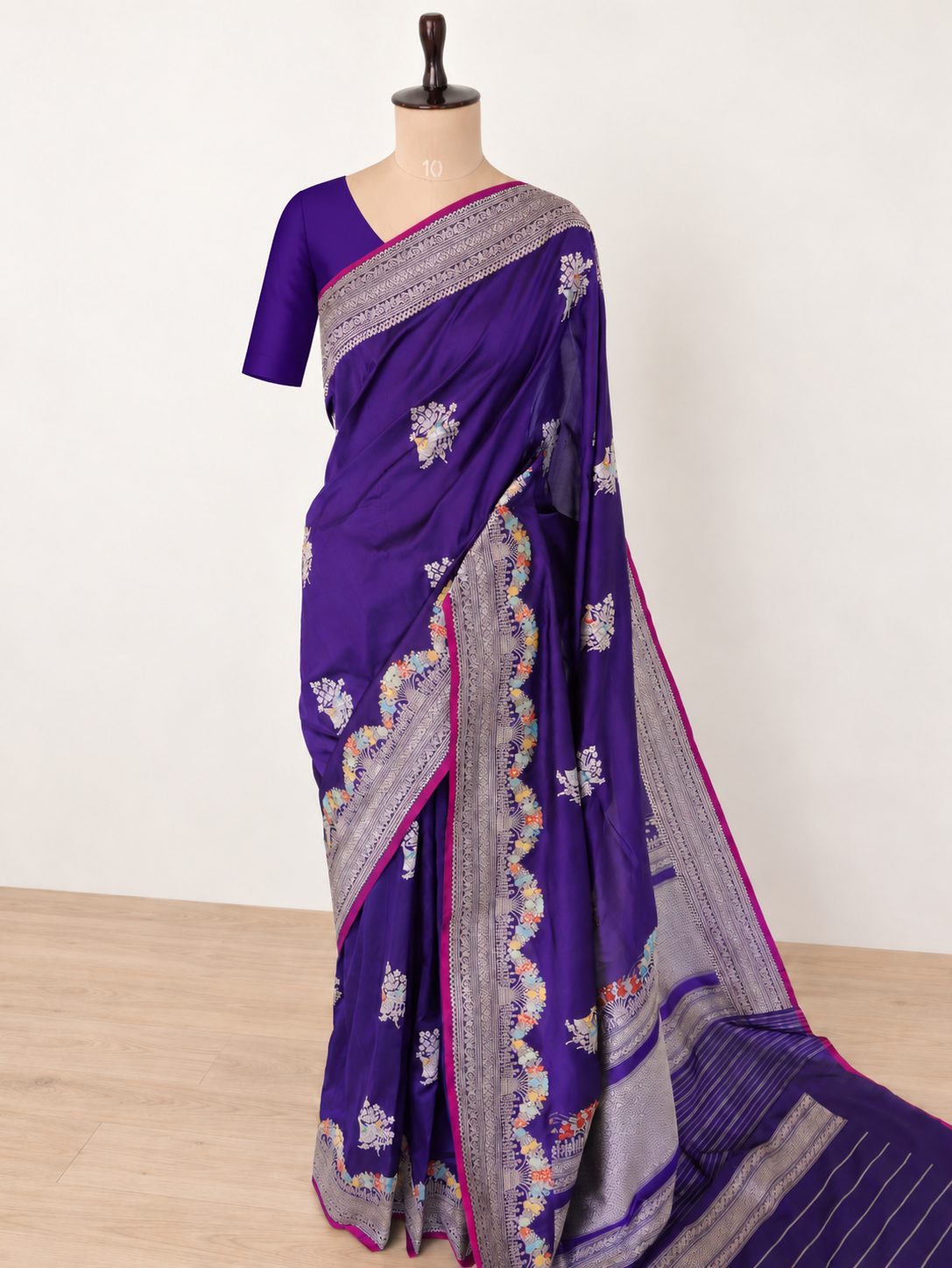 Rich royal purple with a contrasting magenta edge and multicoloured accents Katan Silk Banarasi saree pallu detail