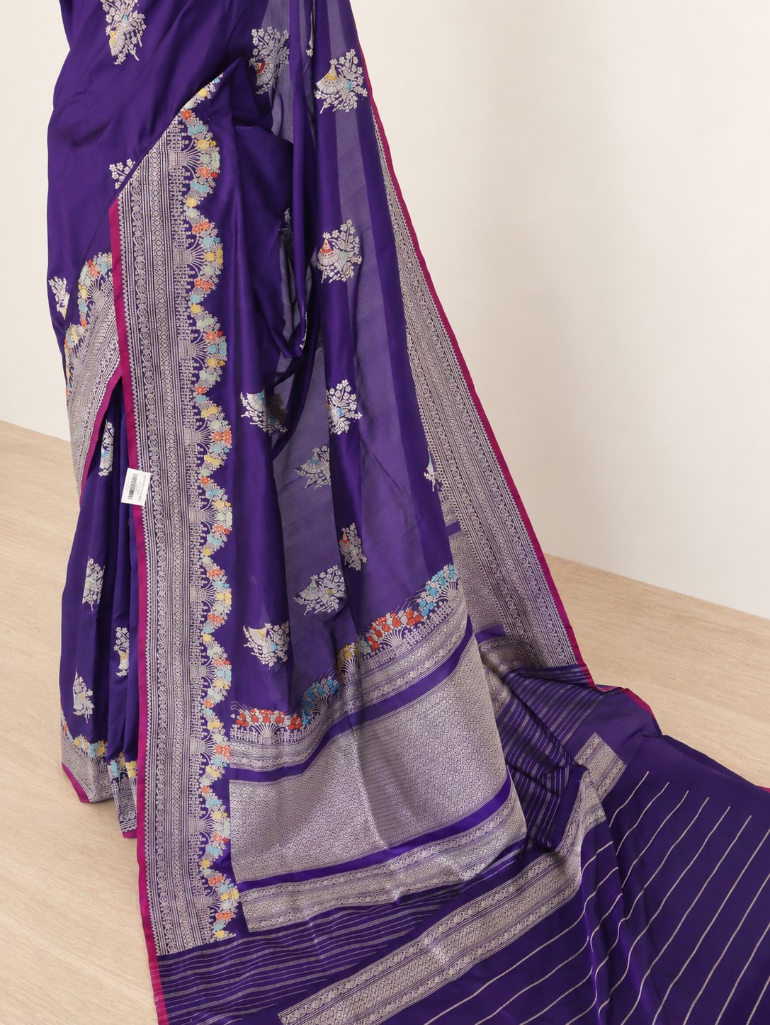 Rich royal purple with a contrasting magenta edge and multicoloured accents Katan Silk Banarasi saree border closeup