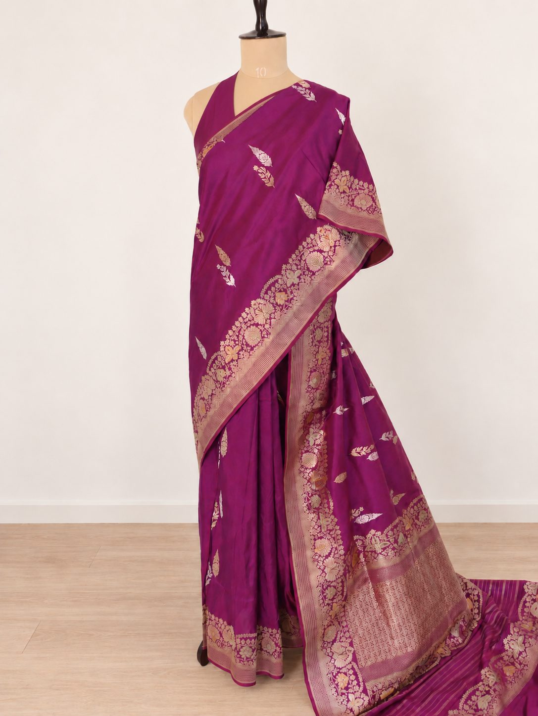 Rich purple-magenta with gold and silver-toned zari and subtle multicoloured accents Katan Silk Banarasi saree front drape view