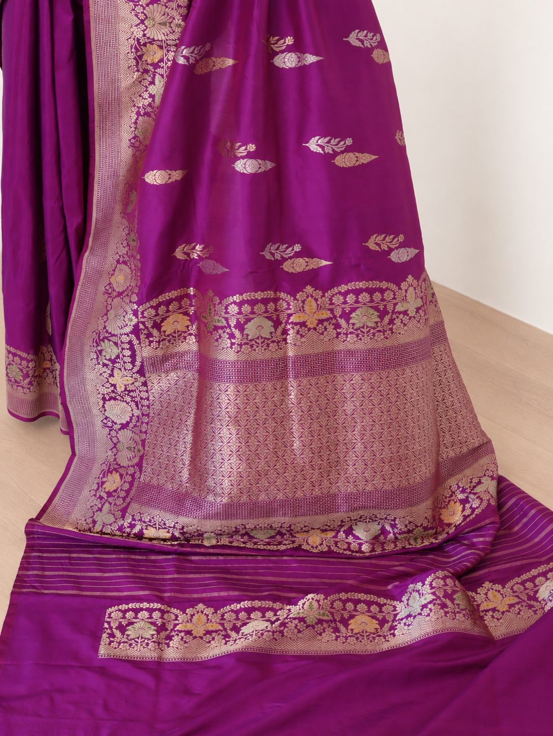 Rich purple-magenta with gold and silver-toned zari and subtle multicoloured accents Katan Silk Banarasi saree full spread