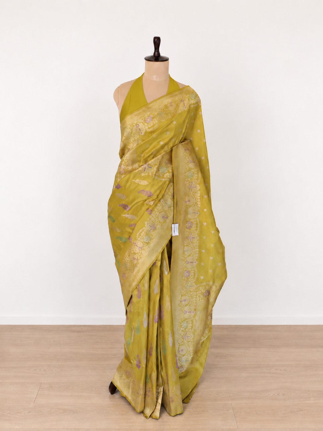 Mustard yellow with a subtle olive undertone, accented with lilac, mint green and light gold zari Katan Silk Banarasi saree front drape view