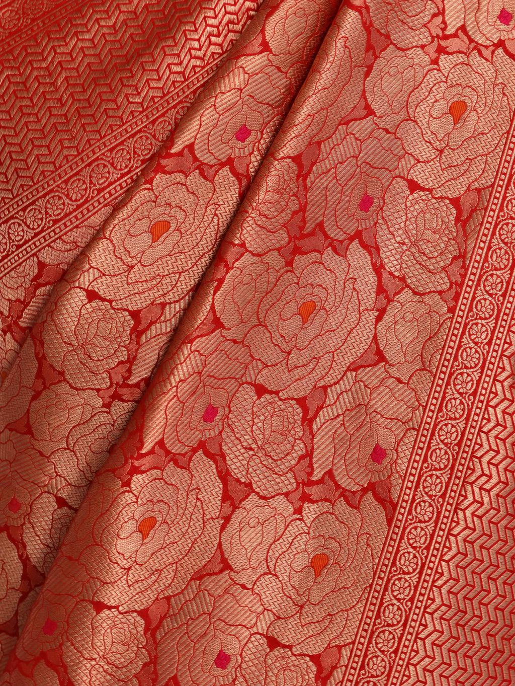 Rich red with metallic zari and subtle pink and orange Meenakari accents Katan Silk Banarasi saree pallu detail
