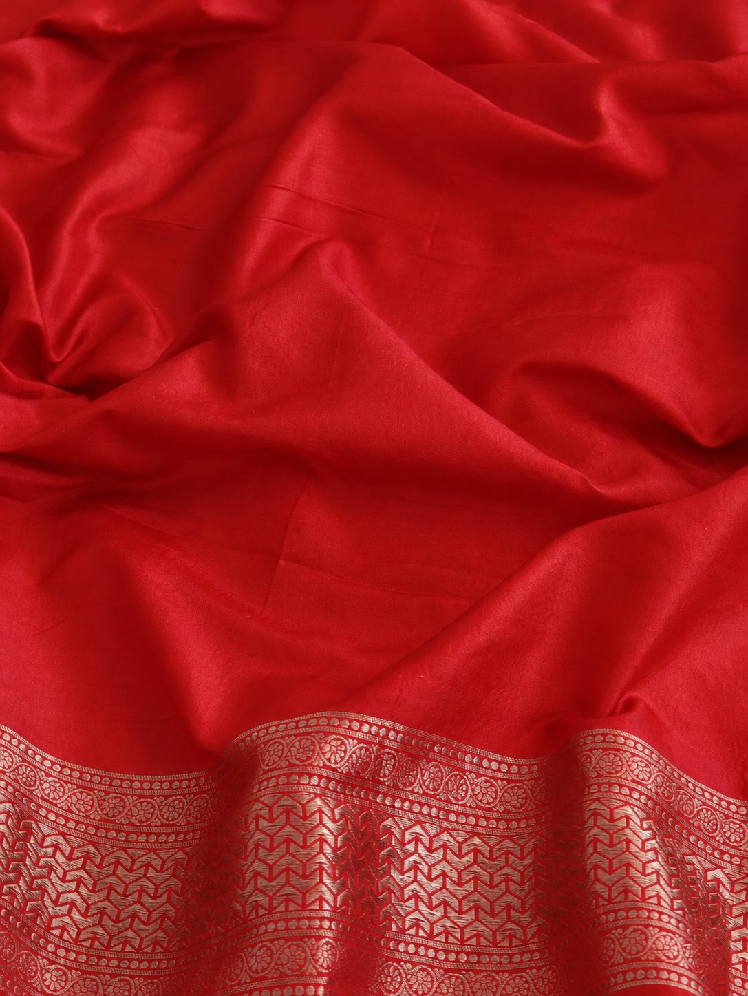 Rich red with metallic zari and subtle pink and orange Meenakari accents Katan Silk Banarasi saree full spread