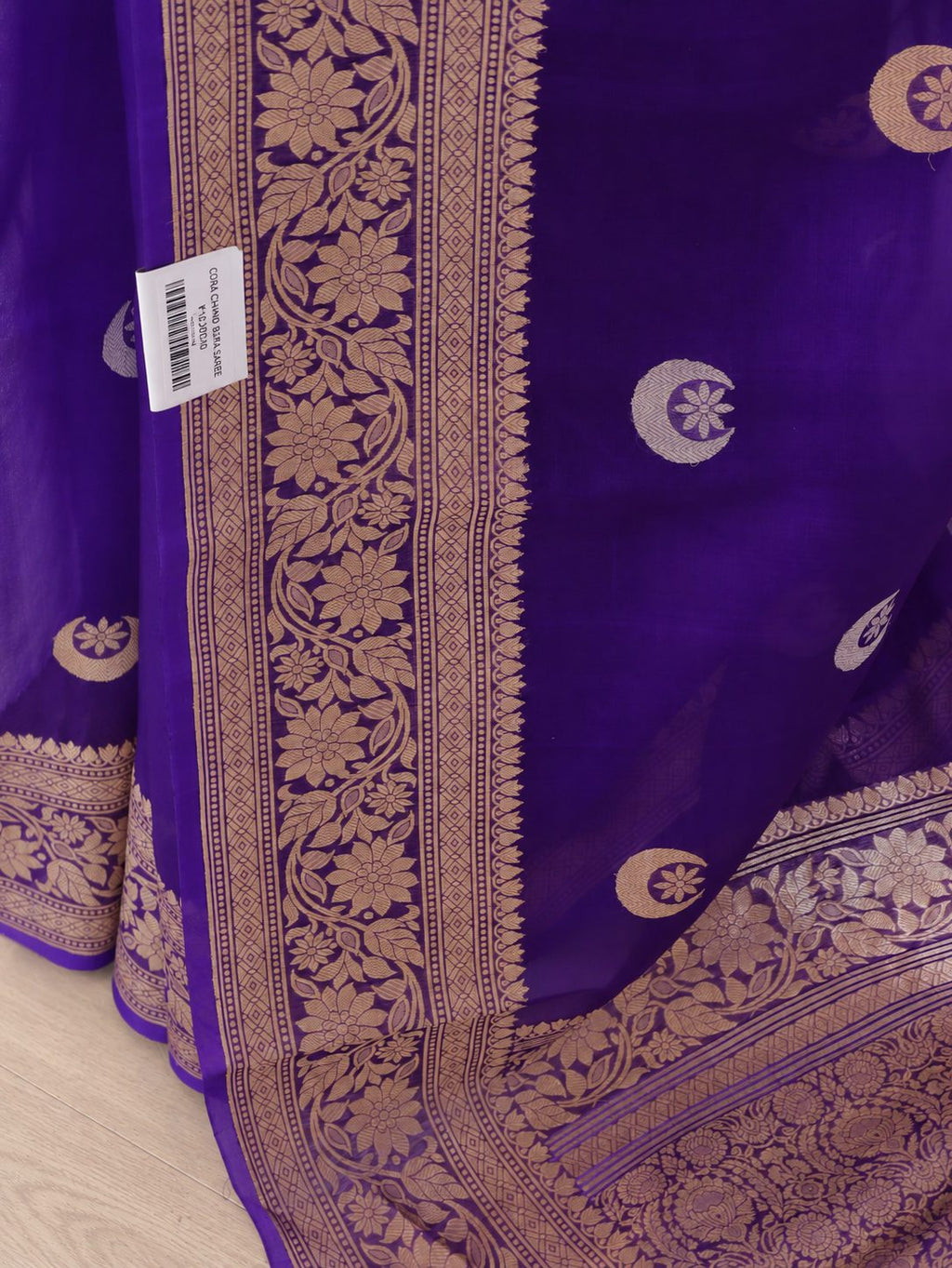 Rich royal purple with contrasting gold toned zari detailing Kora Silk Banarasi saree front drape view