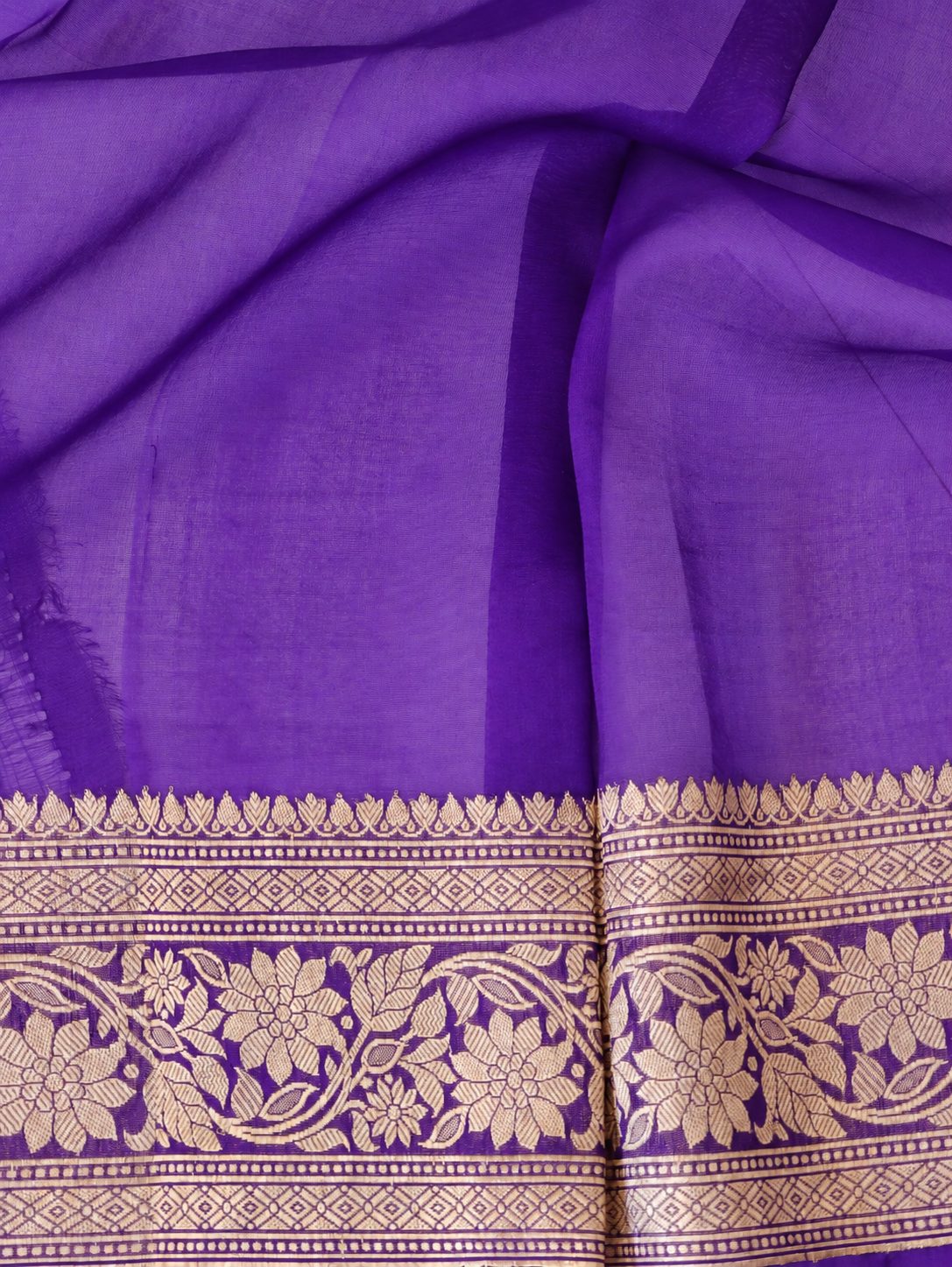 Rich royal purple with contrasting gold toned zari detailing Kora Silk Banarasi saree front drape view
