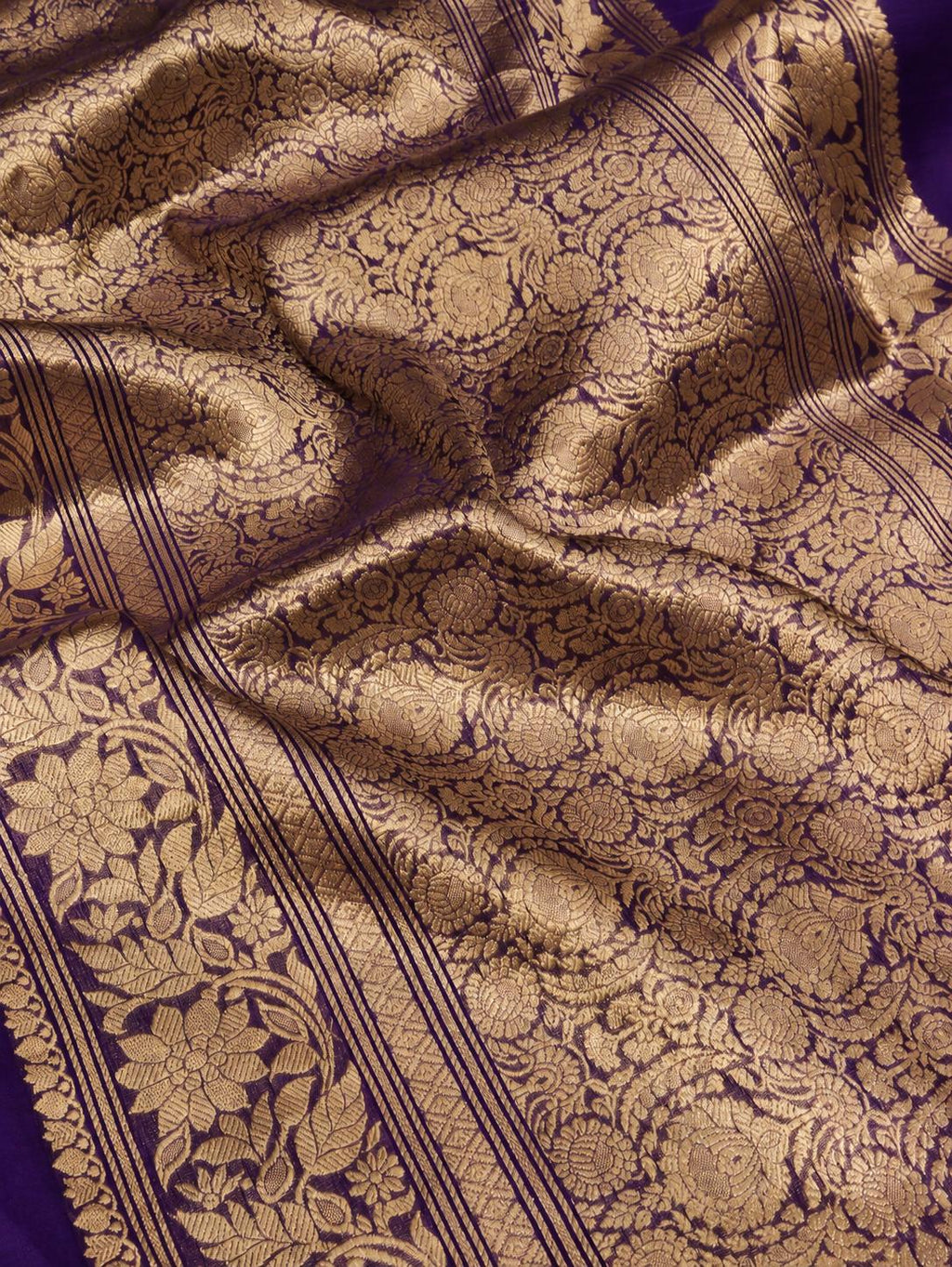 Rich royal purple with contrasting gold toned zari detailing Kora Silk Banarasi saree front drape view