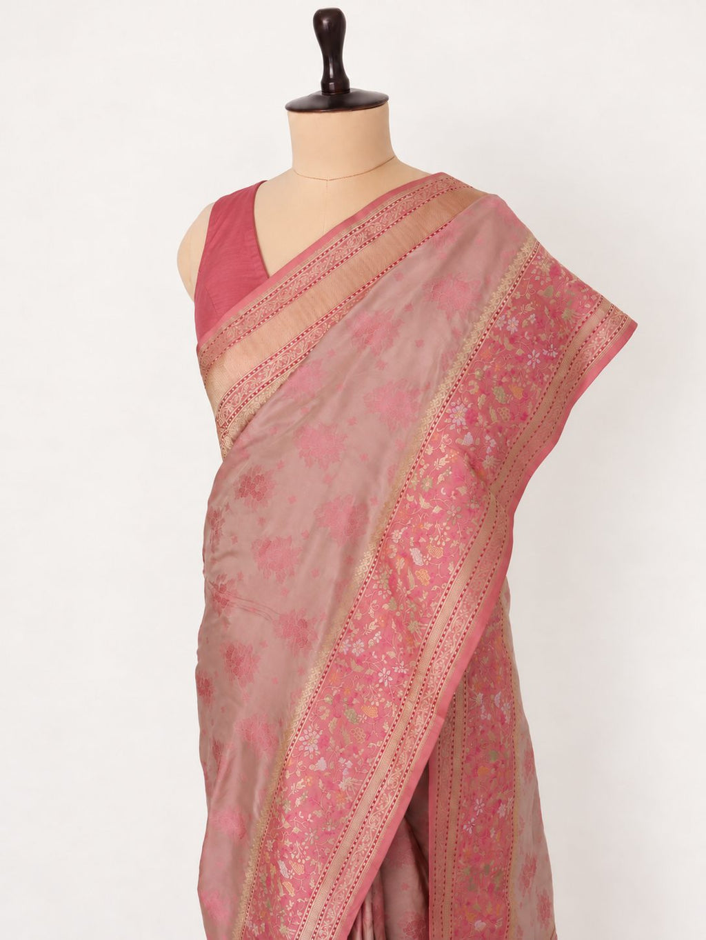 Soft champagne-beige body with rose-pink borders and pallu, accented with gold and silver-toned zari Katan Silk Banarasi saree front drape view