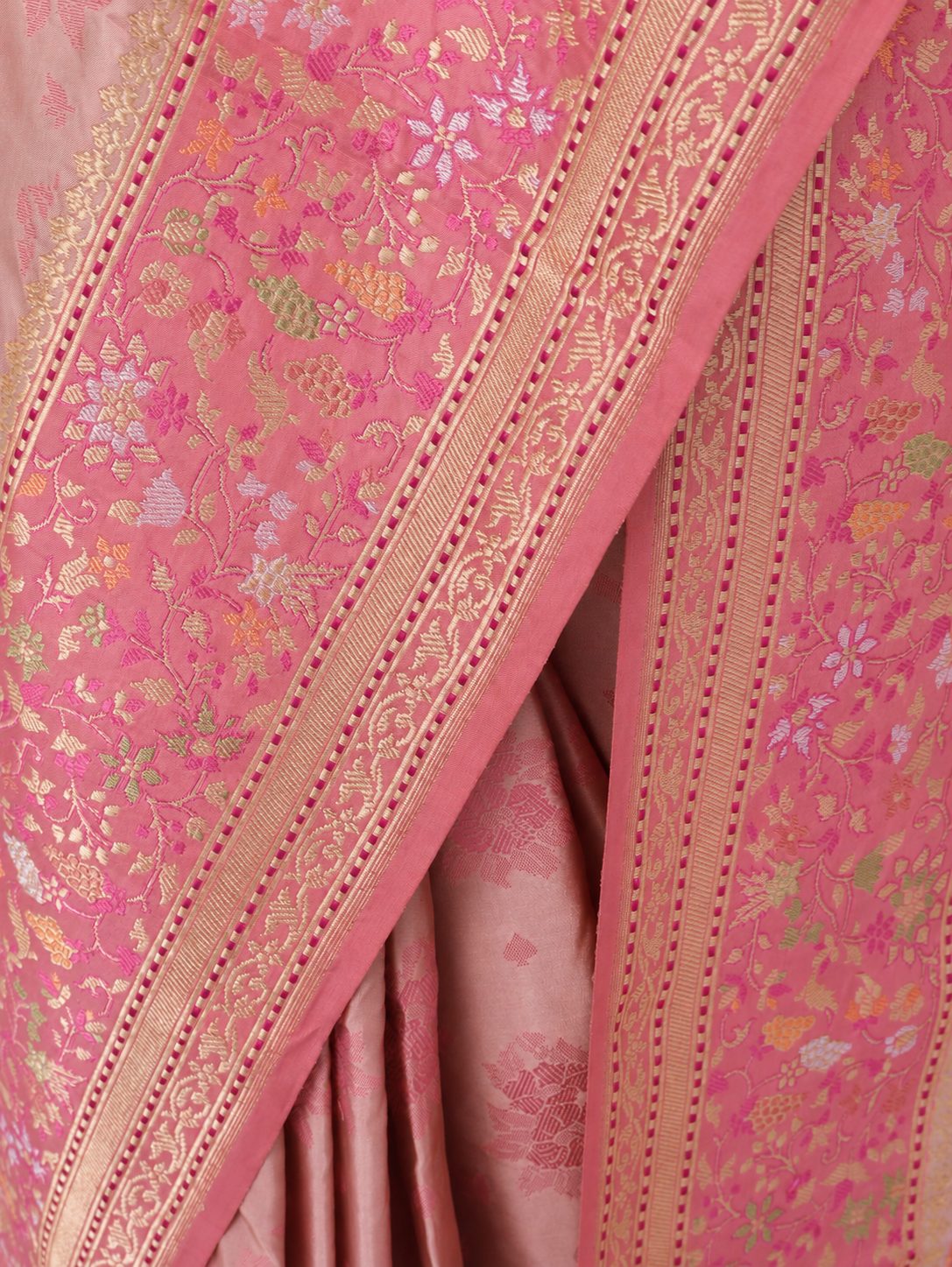 Soft champagne-beige body with rose-pink borders and pallu, accented with gold and silver-toned zari Katan Silk Banarasi saree pallu detail