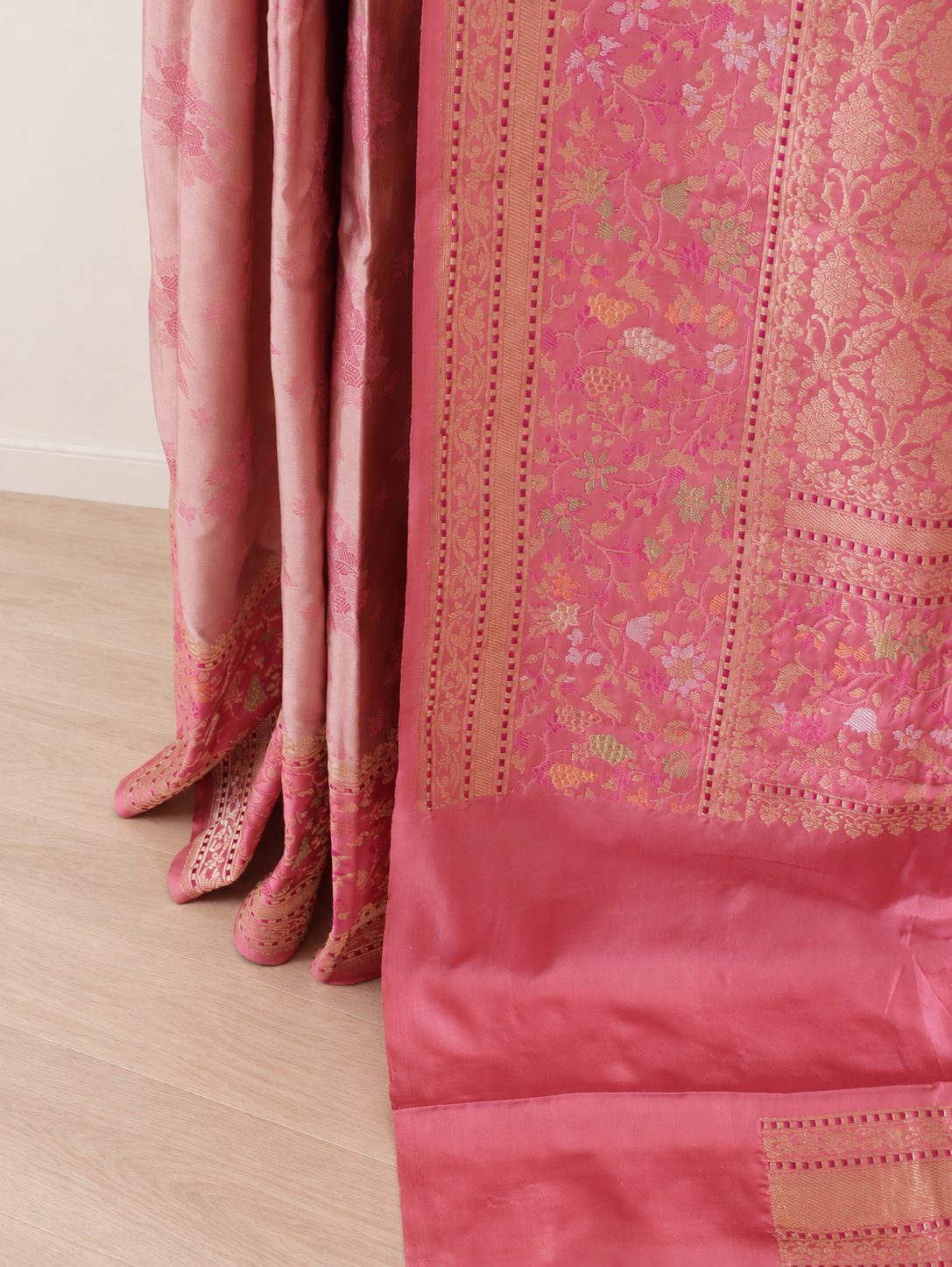 Soft champagne-beige body with rose-pink borders and pallu, accented with gold and silver-toned zari Katan Silk Banarasi saree blouse piece