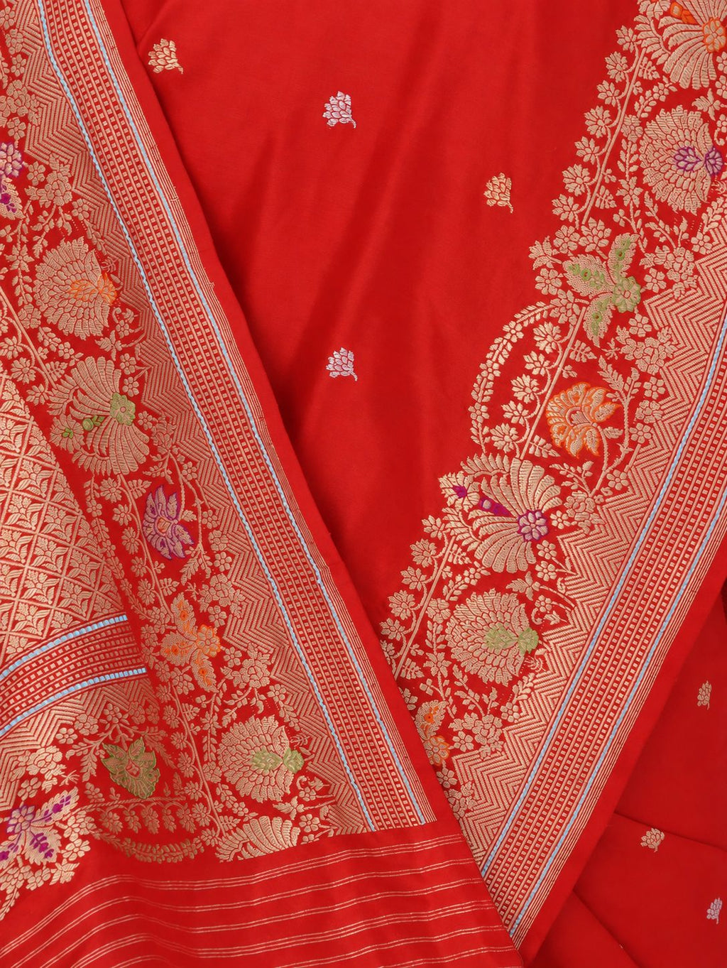 Rich vermilion red with gold and silver-toned zari, accented with green, purple and orange details Katan Silk Banarasi saree border closeup