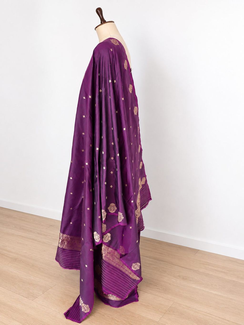 Rich plum purple with gold-toned zari detailing and subtle magenta edging Katan Silk Banarasi suit sleeve detail