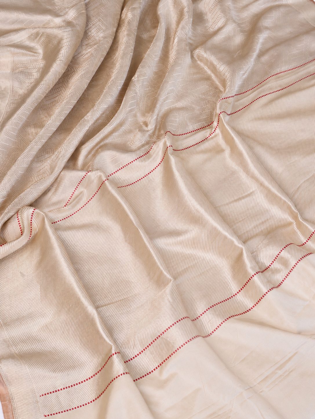 Soft ivory with a subtle champagne sheen and delicate red accents Mashru Kinkhab Banarasi saree pallu detail