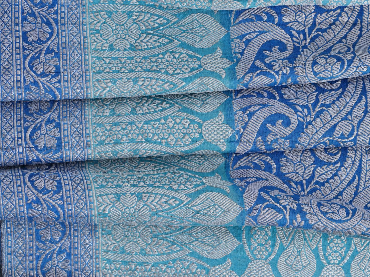 A soft steel-blue and aqua combination, complemented by a royal-blue pallu and silver-toned zari Tussar Silk Banarasi saree front drape view
