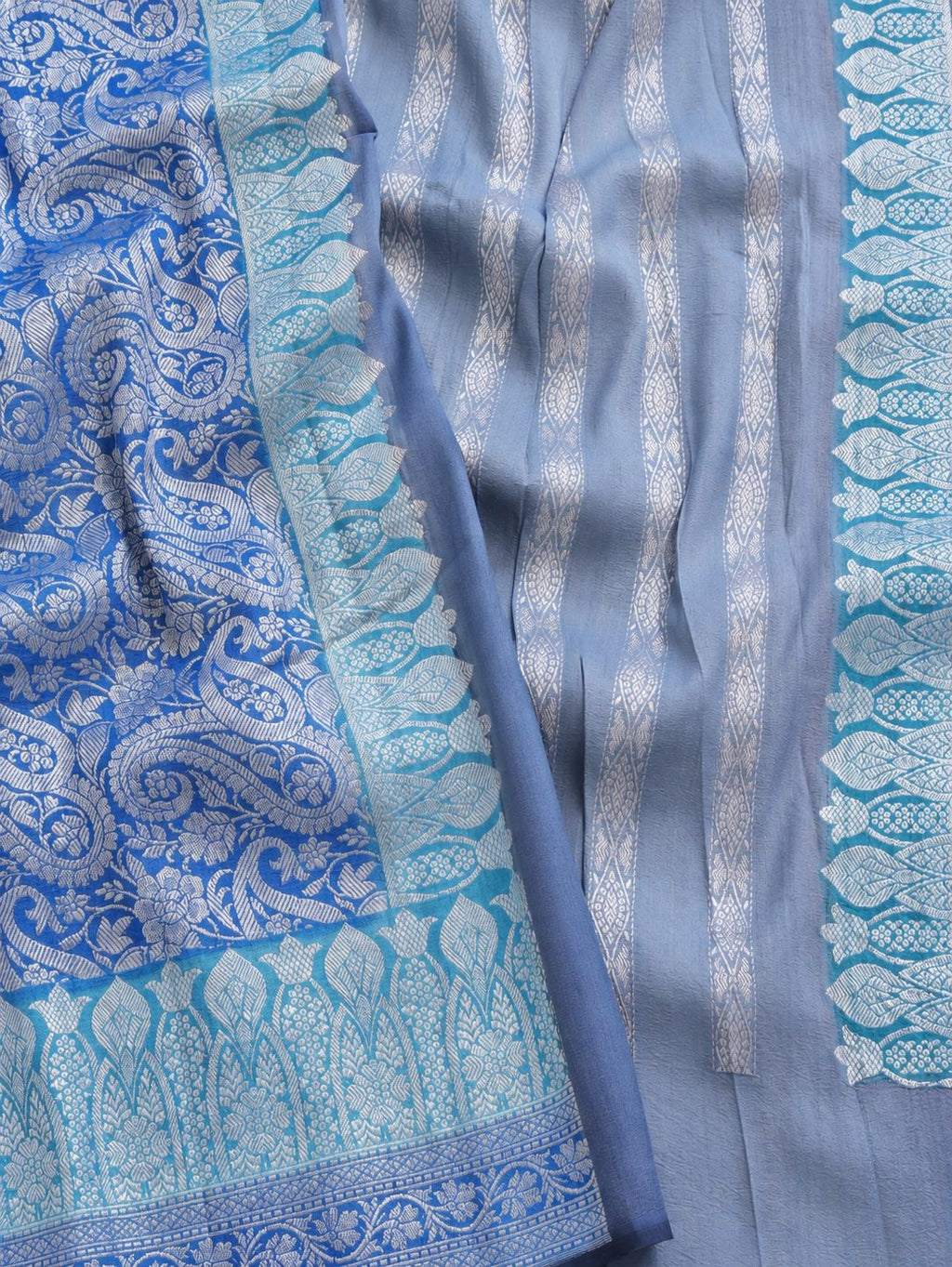 A soft steel-blue and aqua combination, complemented by a royal-blue pallu and silver-toned zari Tussar Silk Banarasi saree front drape view