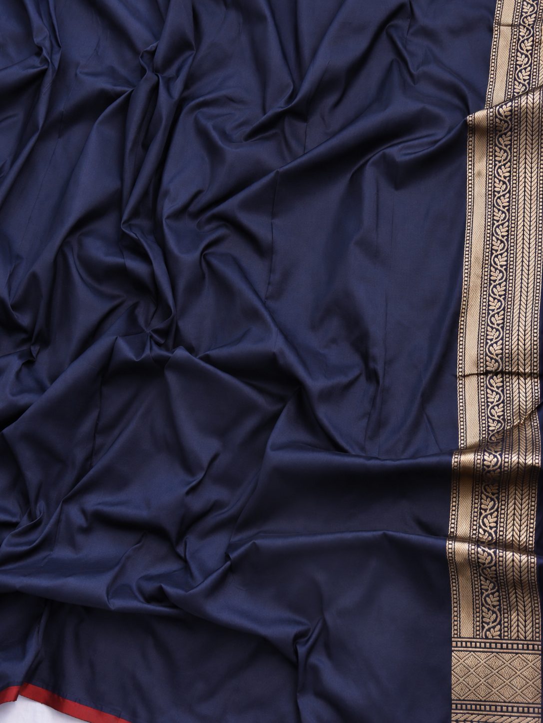 Deep navy blue with champagne gold zari and small red floral accents Katan Silk Banarasi saree blouse piece