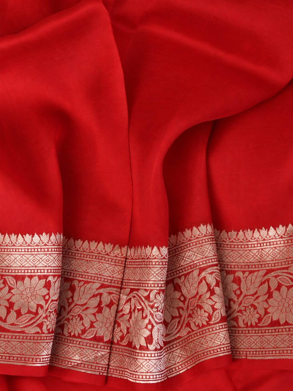 Rich vermilion red with softly contrasting metallic zari detailing Cora Chand Buta Saree Banarasi saree texture detail