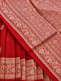Rich vermilion red with softly contrasting metallic zari detailing Cora Chand Buta Saree Banarasi saree front drape view
