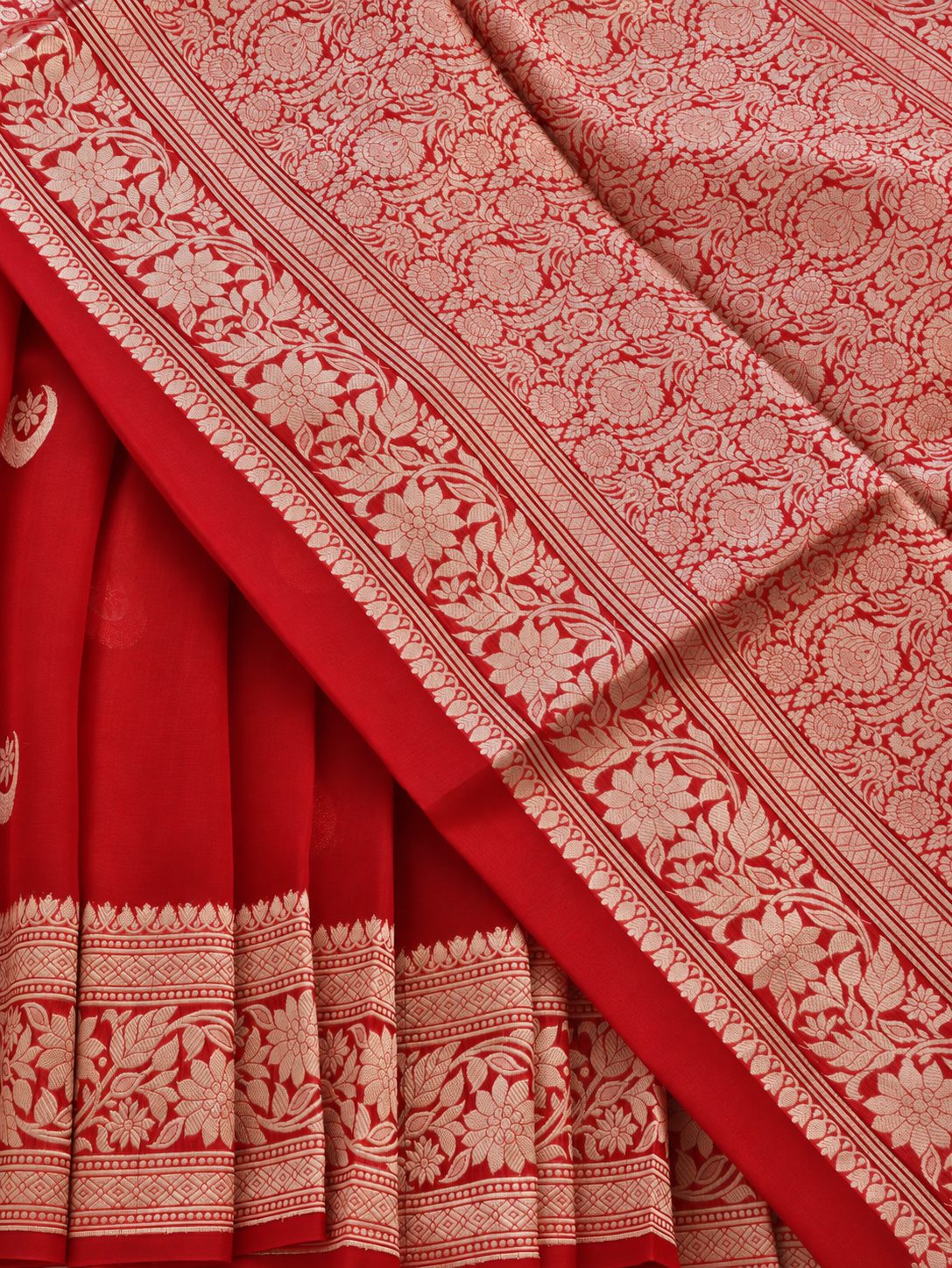 Rich vermilion red with softly contrasting metallic zari detailing Cora Chand Buta Saree Banarasi saree front drape view