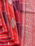 Vibrant coral red and deep plum checks, highlighted with silver-toned woven detailing Katan Silk Banarasi saree front drape view