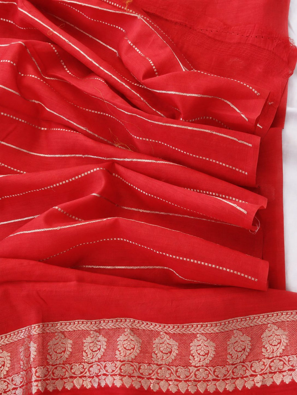 Vibrant vermilion red with delicate champagne-gold zari detailing Linen Cotton Banarasi saree full spread