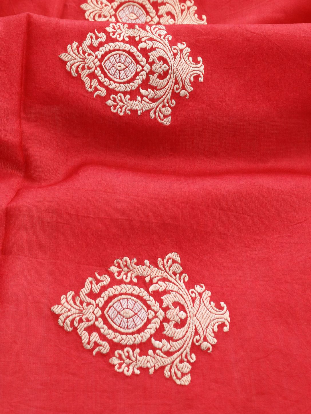 Vibrant vermilion red with delicate champagne-gold zari detailing Linen Cotton Banarasi saree border closeup