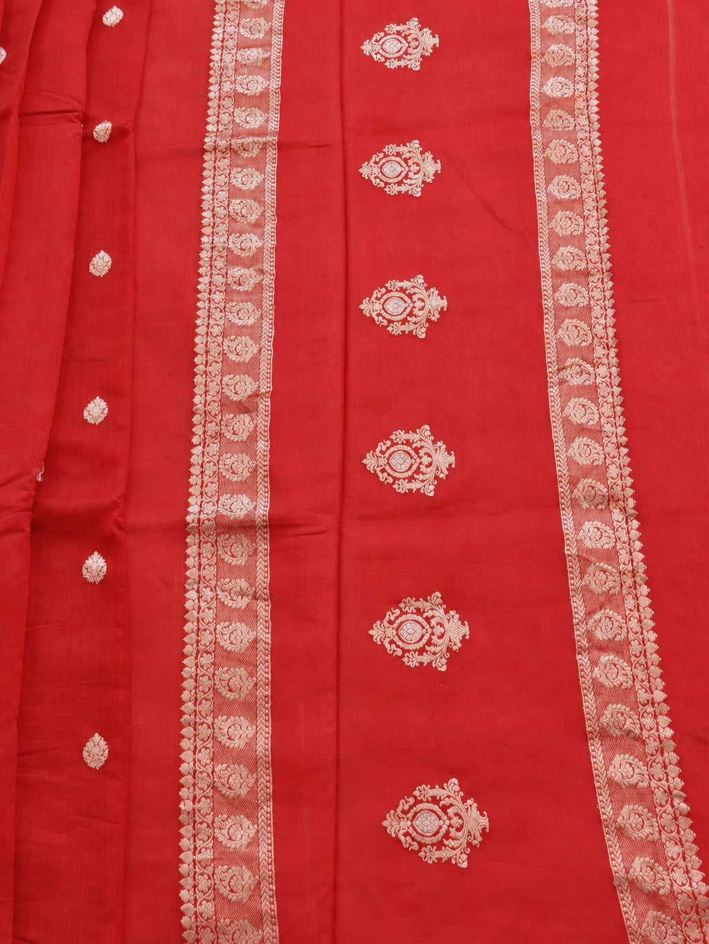 Vibrant vermilion red with delicate champagne-gold zari detailing Linen Cotton Banarasi saree texture detail