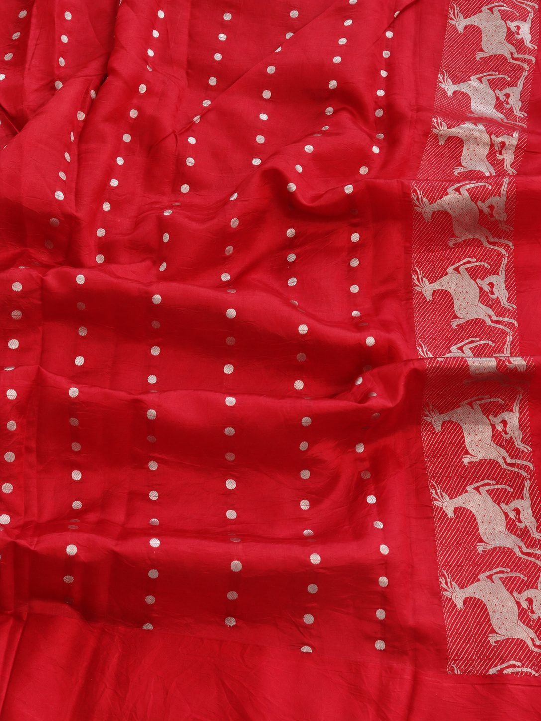 Rich cherry red with silver-toned woven detailing Soft Katan Banarasi saree pallu detail