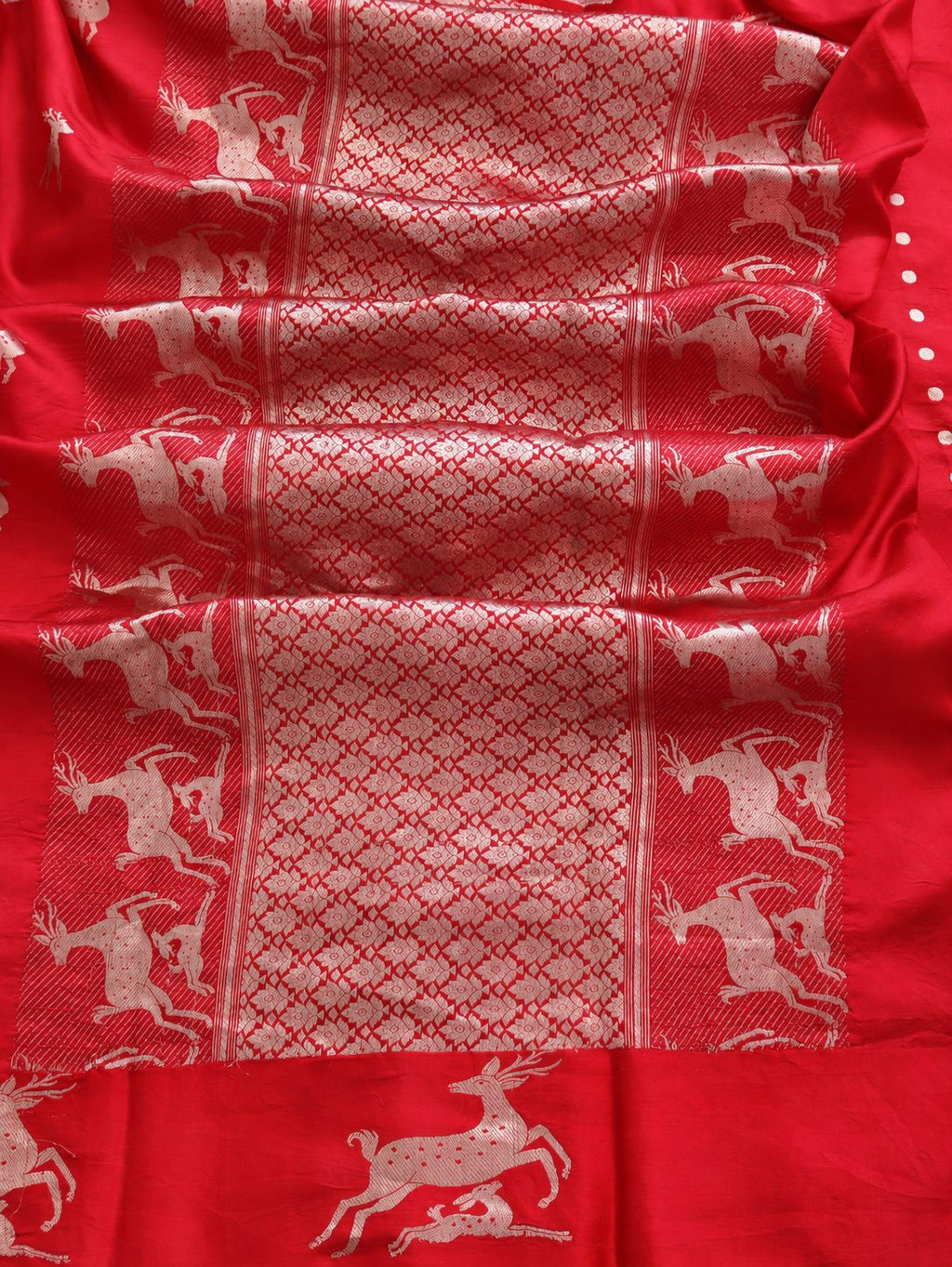 Rich cherry red with silver-toned woven detailing Soft Katan Banarasi saree front drape view