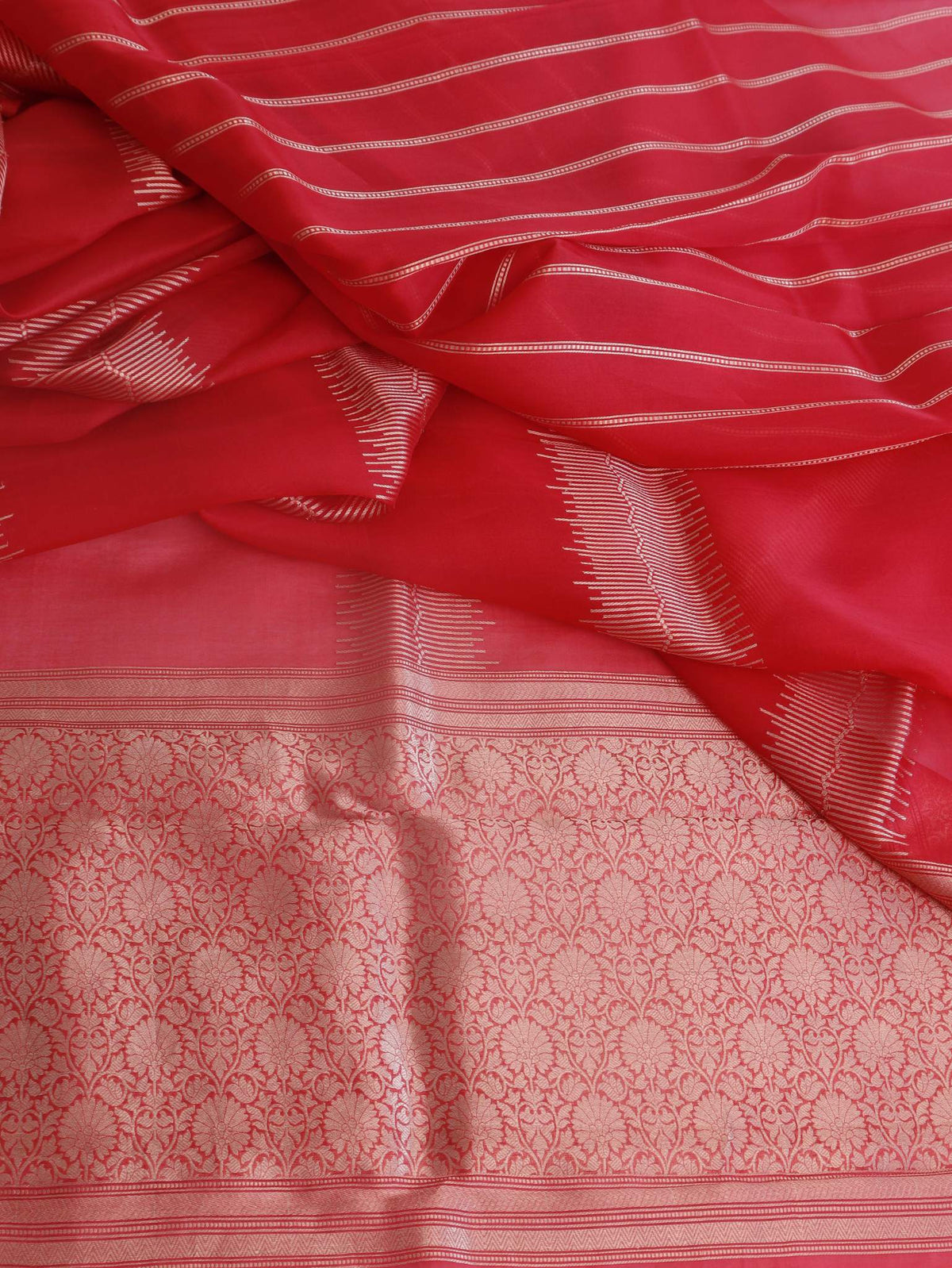 Vibrant coral red with delicate silver toned zari detailing Katan Rangkat Saree Banarasi saree front drape view