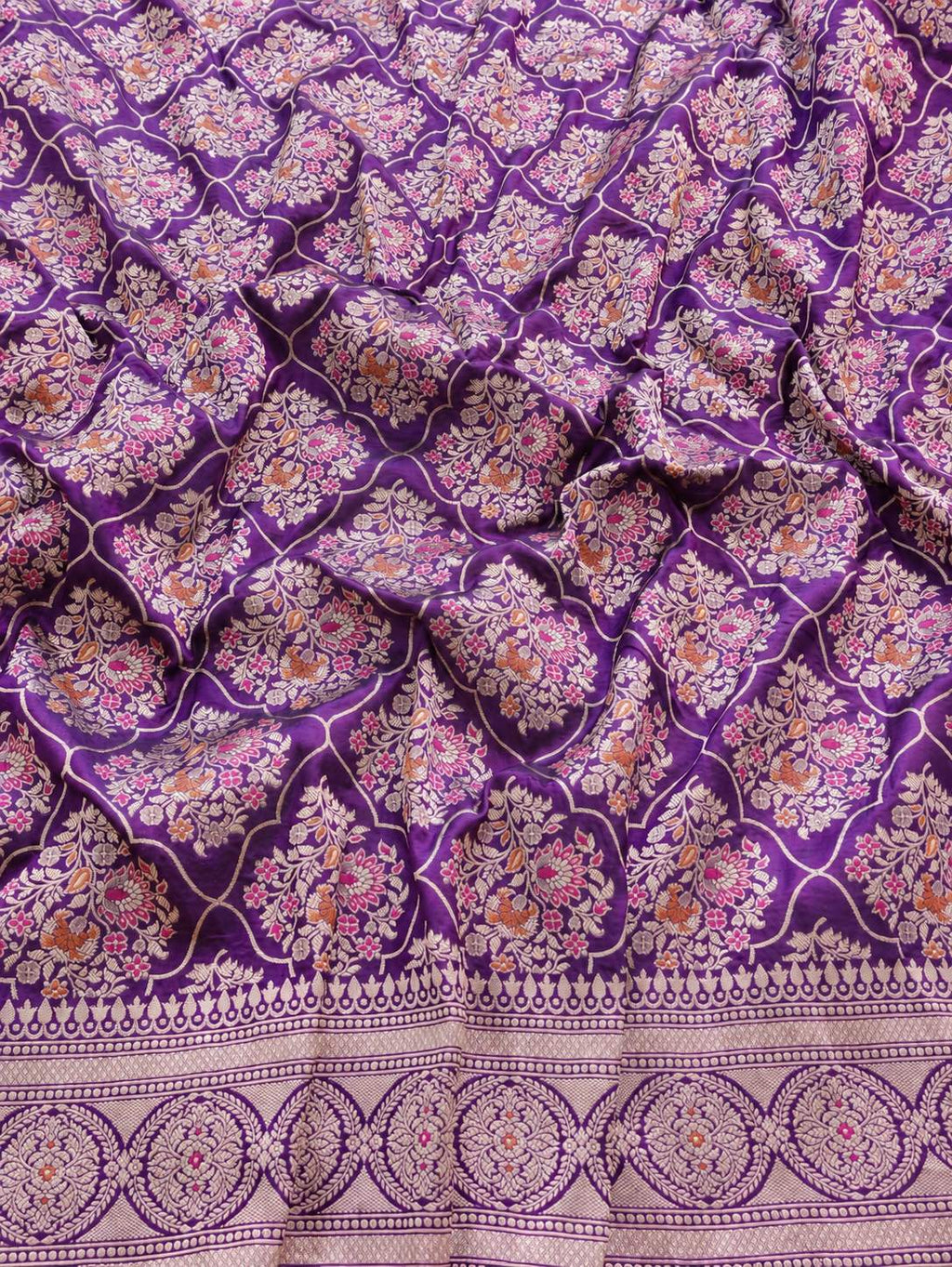 Rich royal purple with pale gold toned zari and vibrant pink and rust-orange floral accents Katan Silk Banarasi saree blouse piece