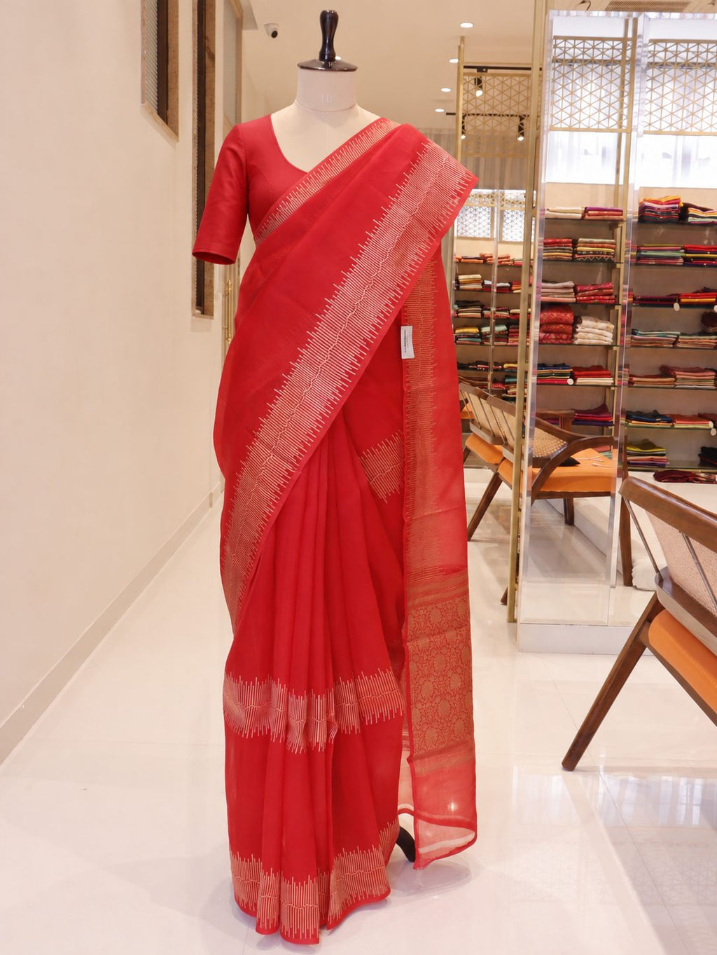 Vibrant vermilion red Kora Silk Banarasi saree front drape view