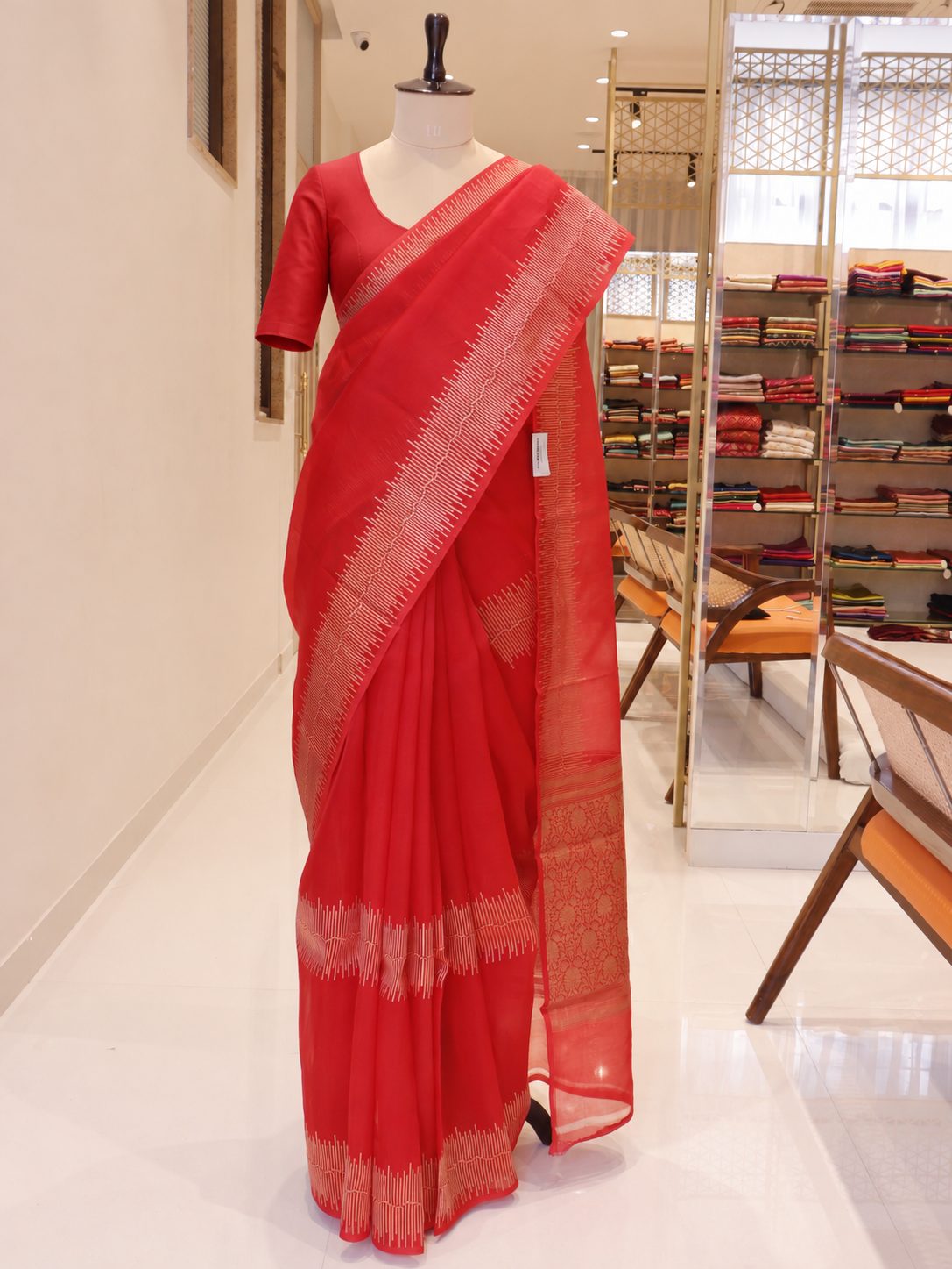Vibrant vermilion red Kora Silk Banarasi saree front drape view