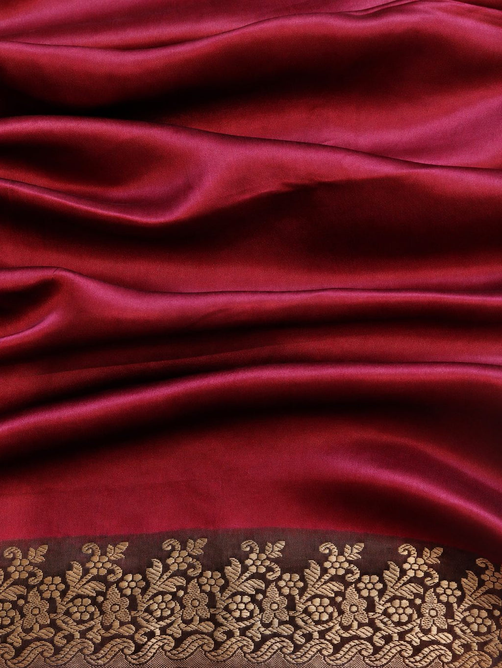 Wine magenta with contrasting red, orange and pink sections, highlighted by gold-toned zari. Katan Silk Banarasi saree zari work detail