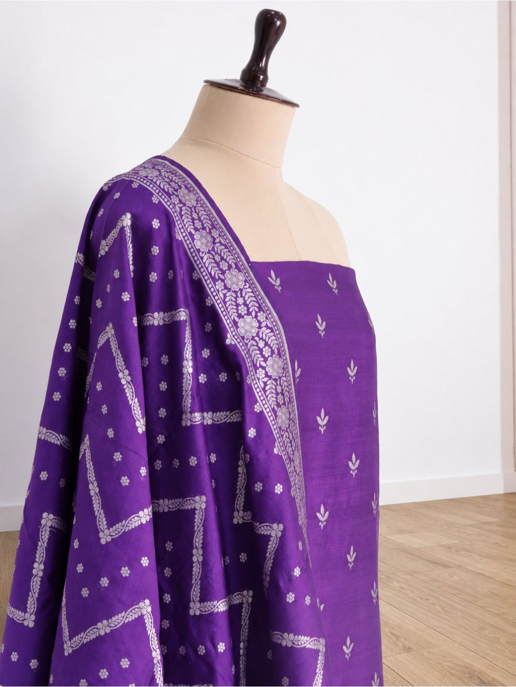 Violet-purple with silver-toned zari detailing. Moonga Silk Banarasi suit front drape view